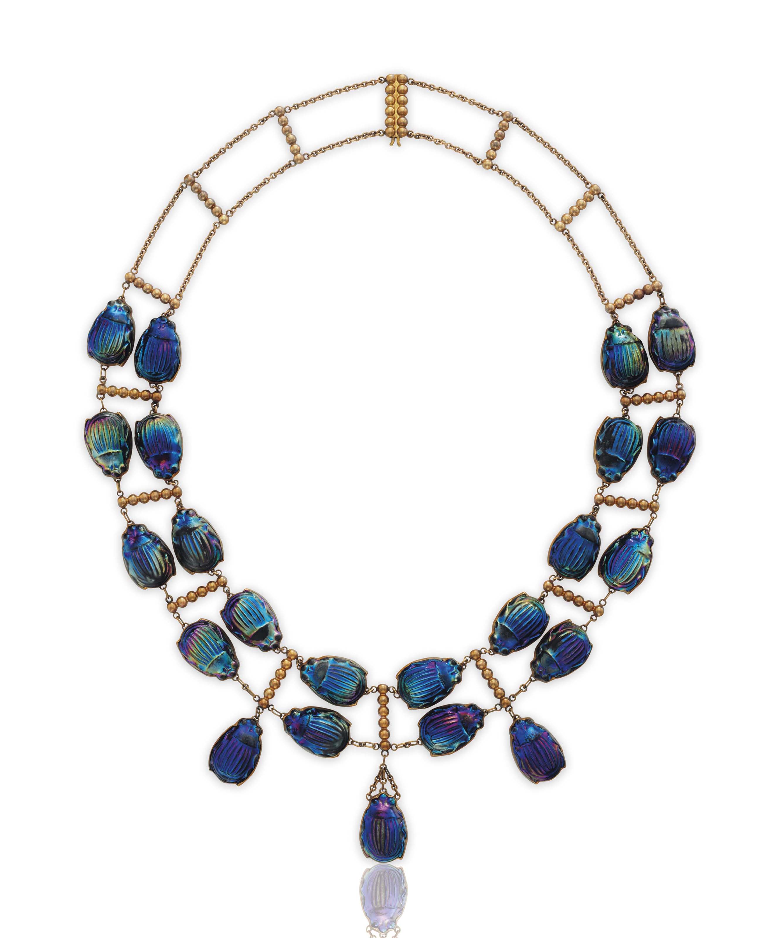 Elsa Peretti™ Sphere necklace in blue lacquer over Japanese hardwood. |  Tiffany & Co.