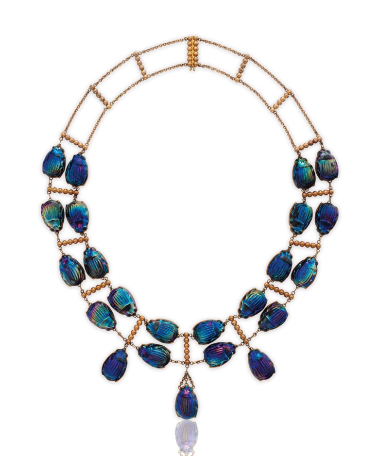 An iconic favrile glass beetle and gold necklace, by Louis Comfort Tiffany, Tiffany & Co. Sold for $106,250 on 20 June 2017 at Christie’s in New York
