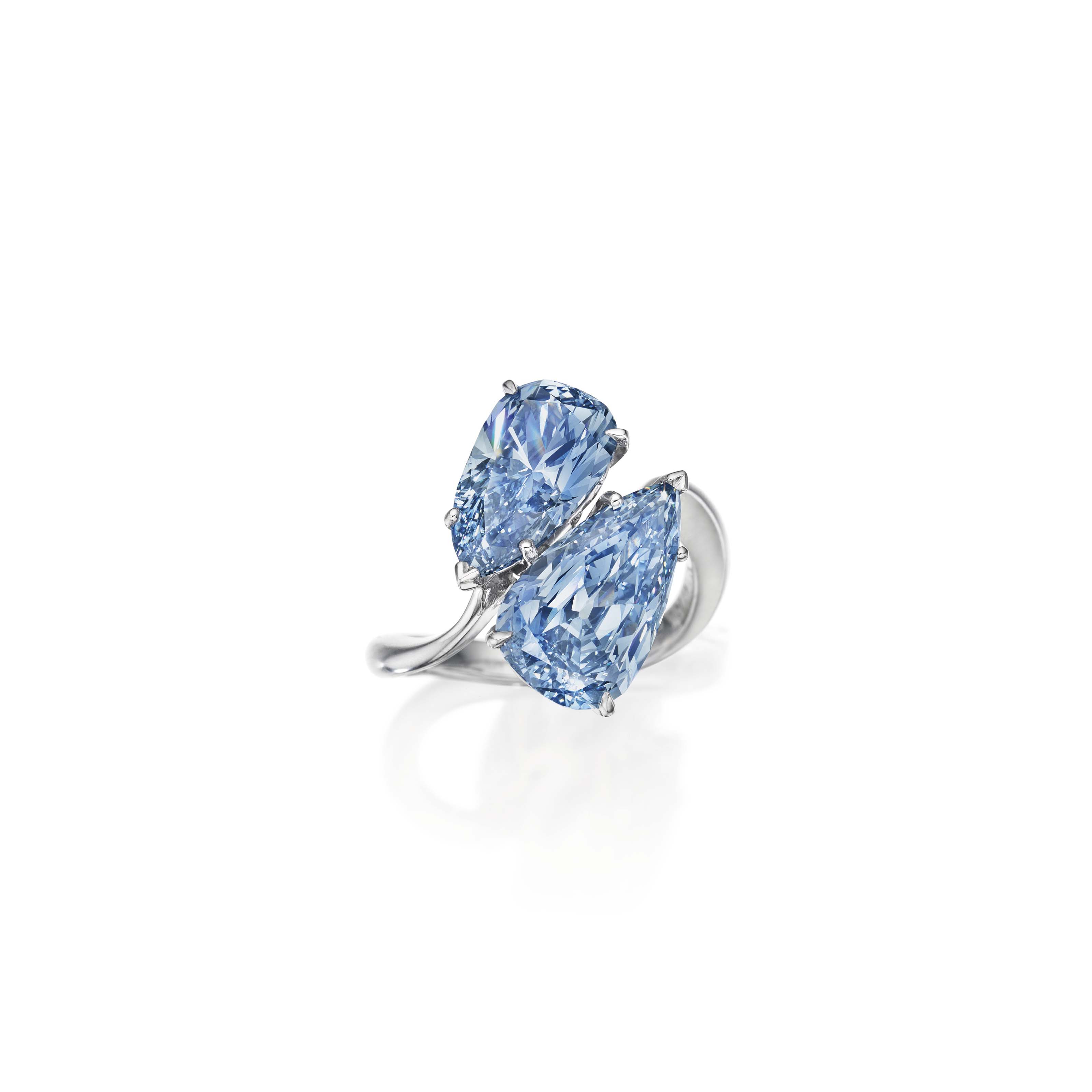 A SUPERB TWIN-STONE COLORED DIAMOND RING, BY GRAFF