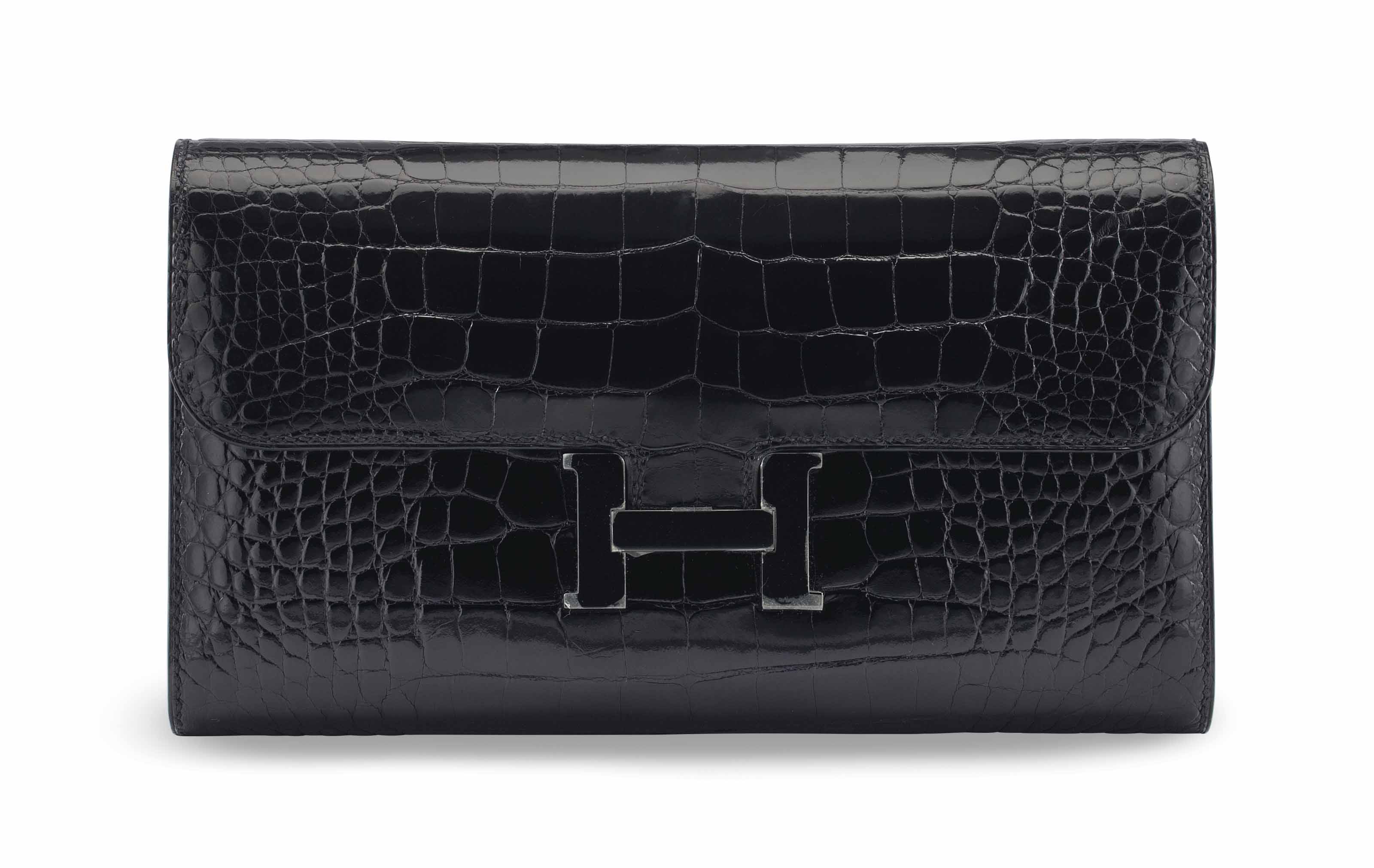 A SHINY BLACK ALLIGATOR SO BLACK CONSTANCE WALLET WITH BLACK