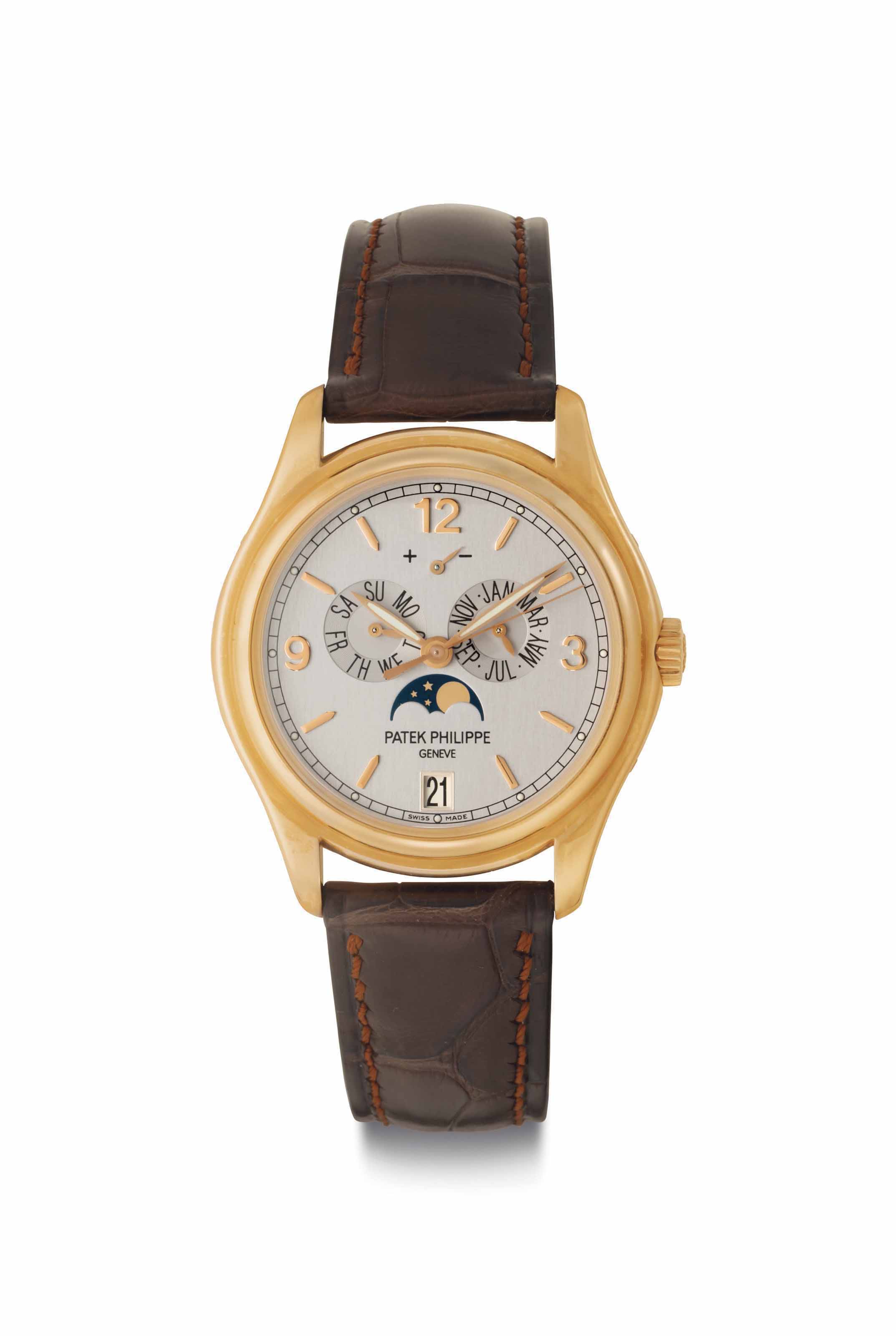 Patek Philippe. A Very Fine and Rare 18k Gold Perpetual Calendar Chronograph Wristwatch with Moon Phases Signed Patek Philippe Geneve Ref. 2499 100 Fourth Series Movement No. 869 252 Case No. 2 792 10...