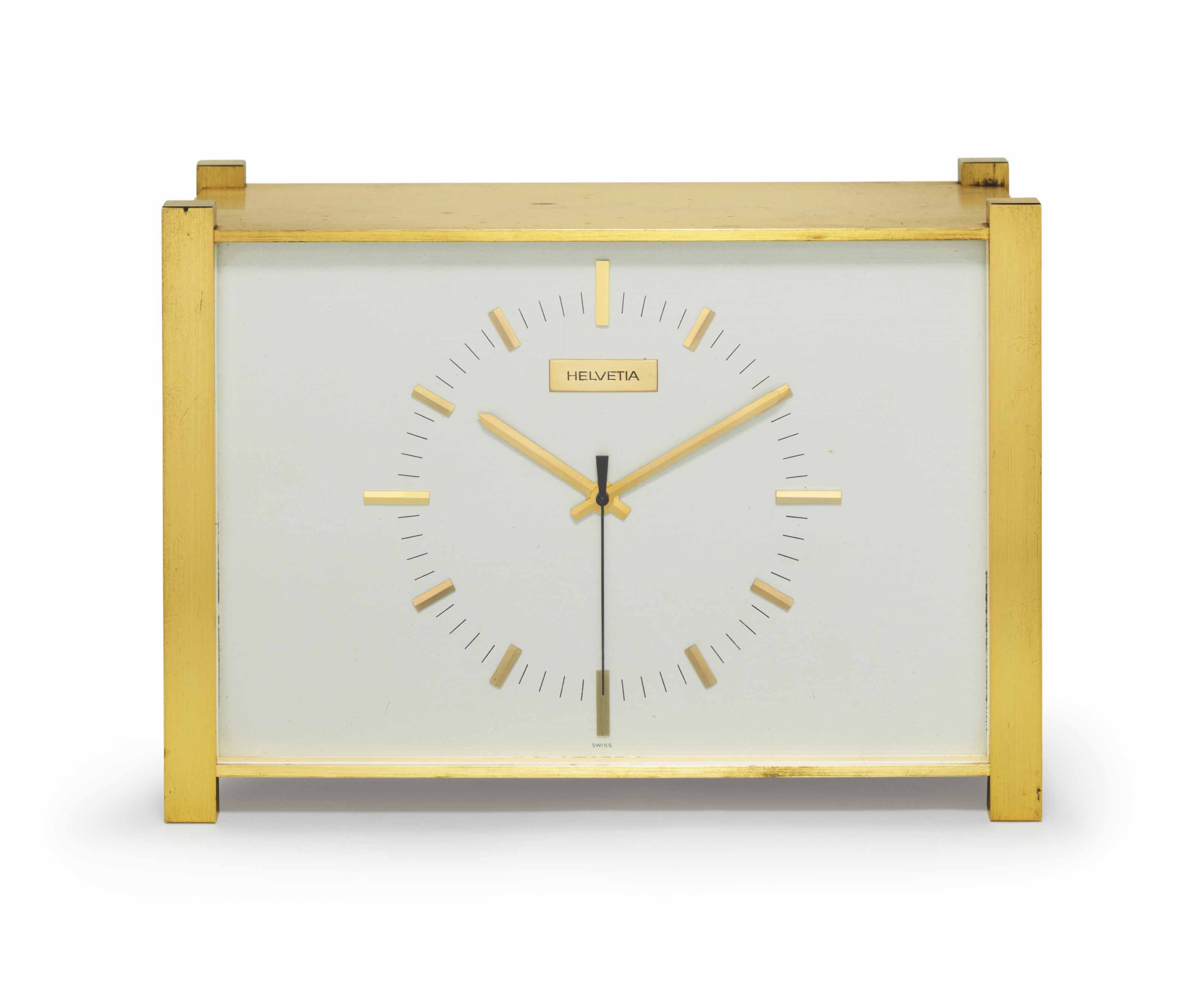 Patek Philippe. A Fine and Early Gilt Brass Desk Clock, Signed 