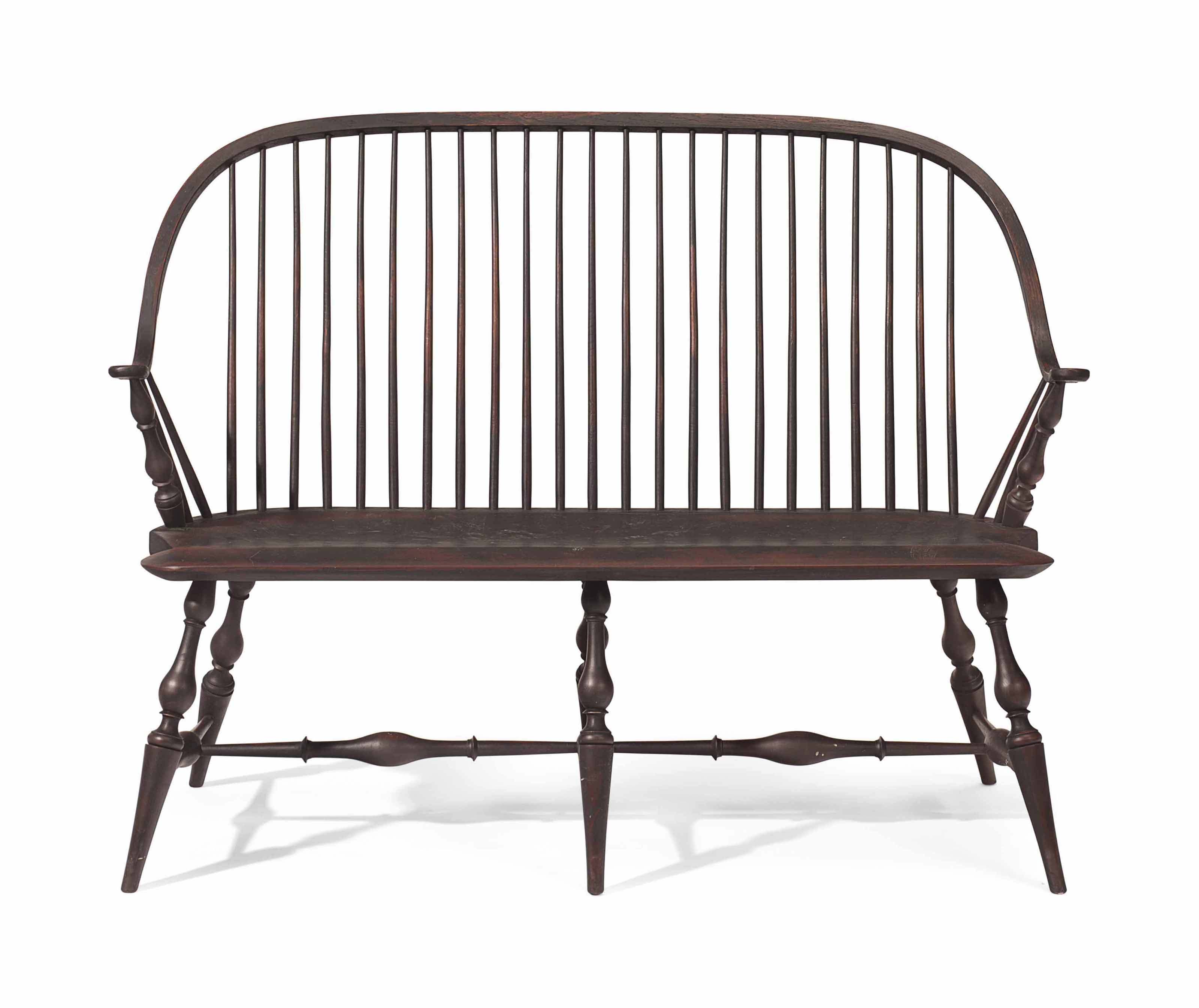 A Windsor Style Black Painted Bow Back Settee American 20th