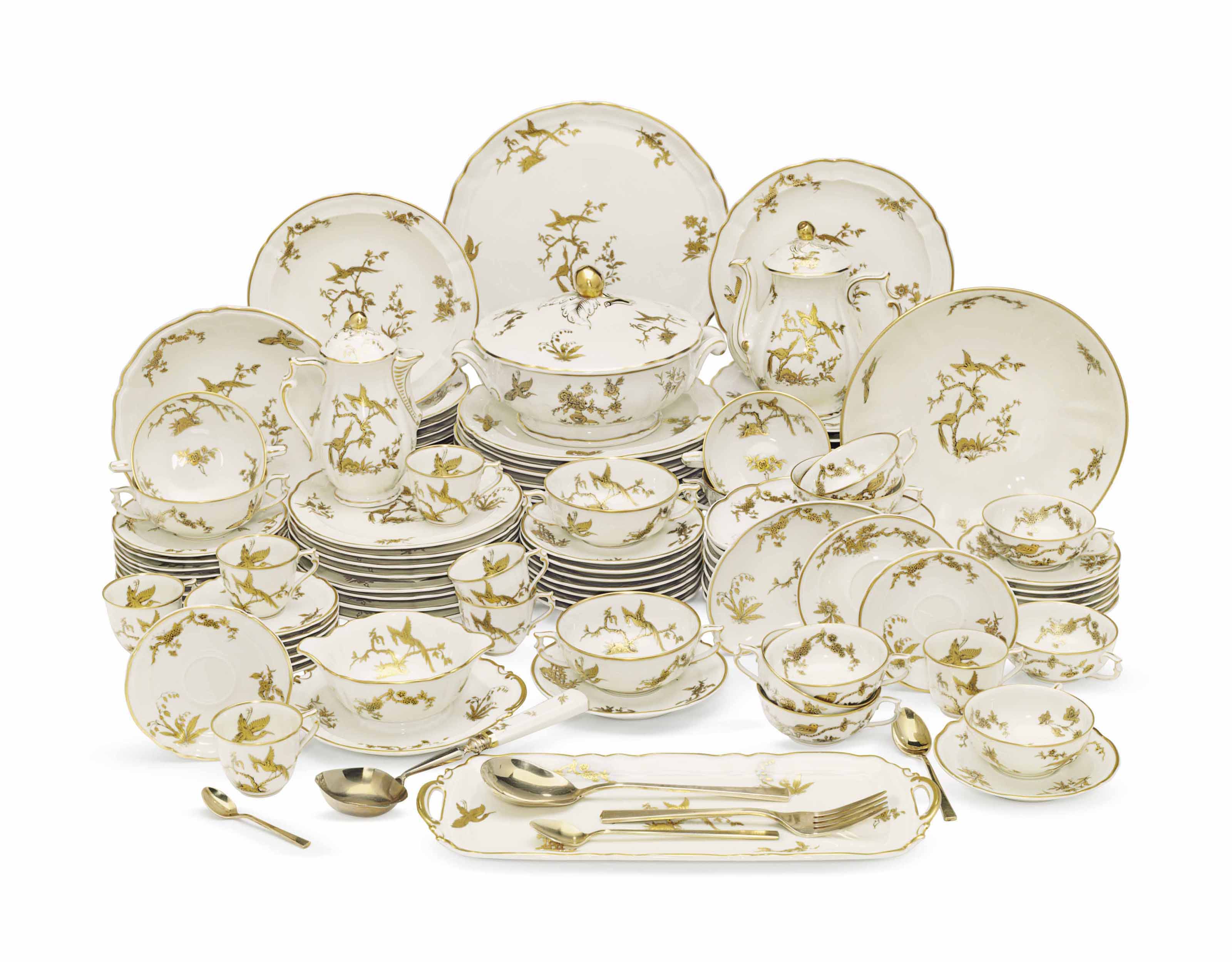 A LIMOGES (BERNARDAUD) PORCELAIN GILT IVORYGROUND DINNER & DESSERT