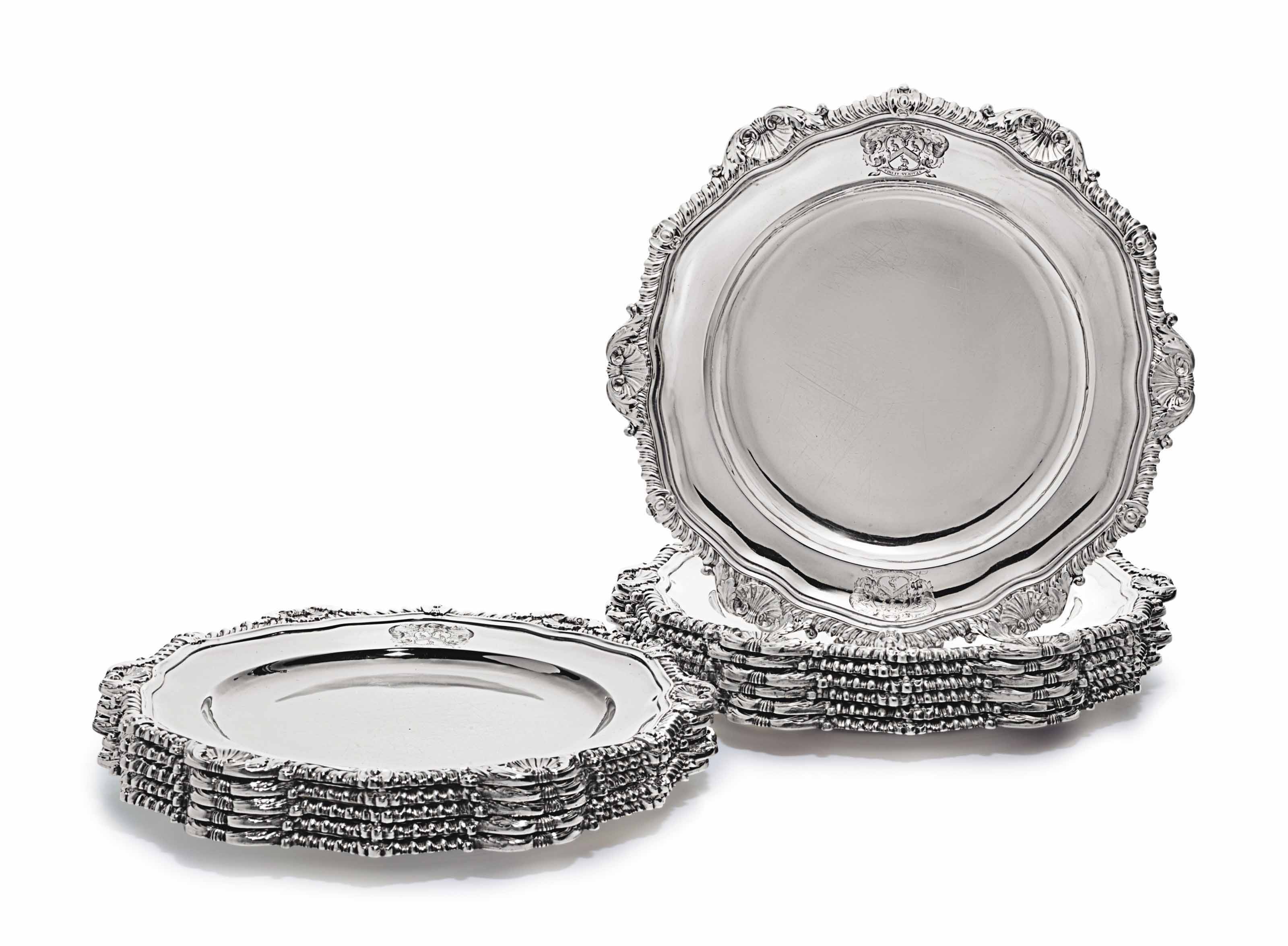 A SET OF TWELVE REGENCY SILVER DINNER PLATES