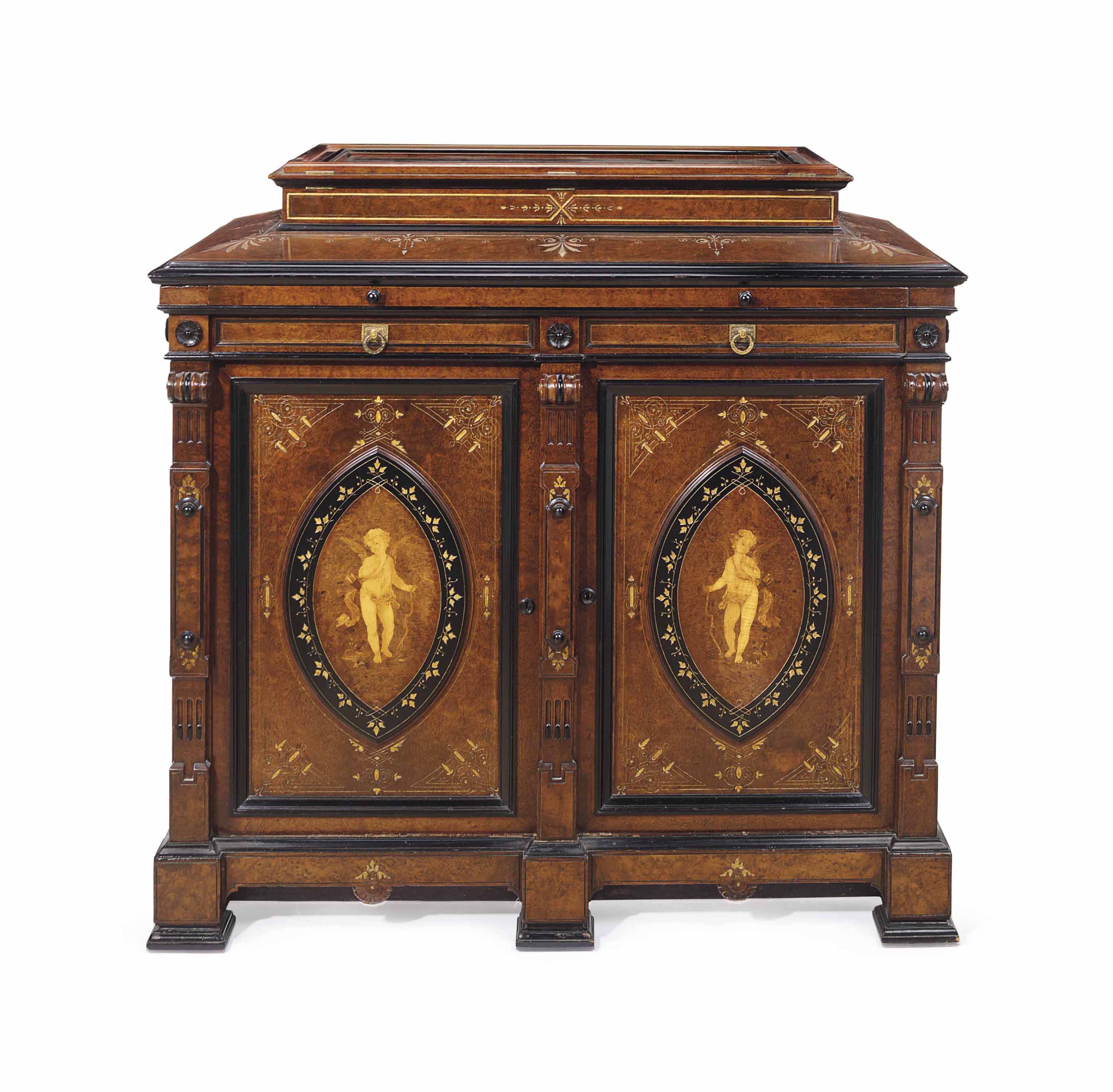 A Renaissance Revival Parcel Gilt Part Ebonized And Marquetry