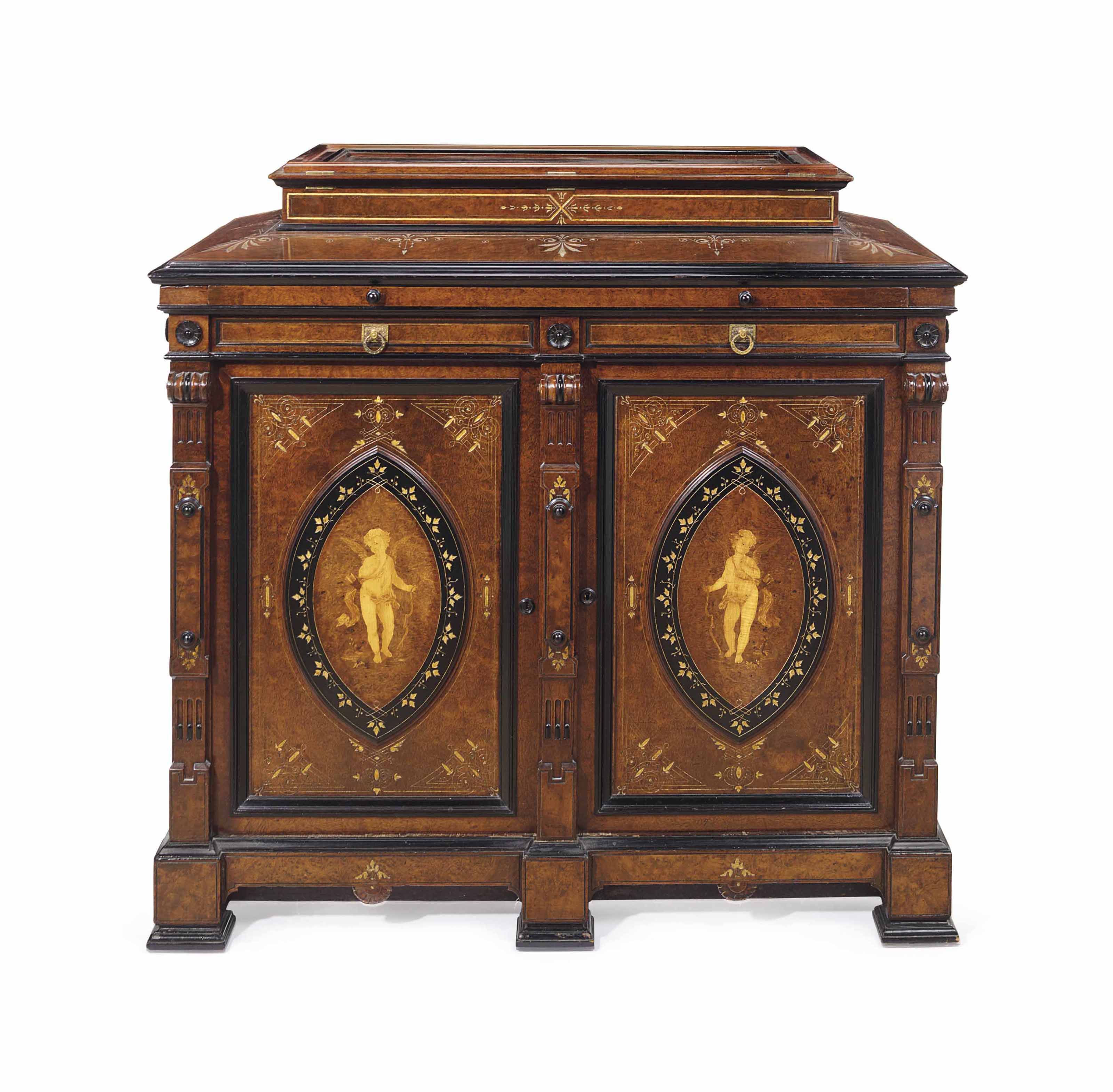 A Renaissance Revival Parcel Gilt Part Ebonized And Marquetry