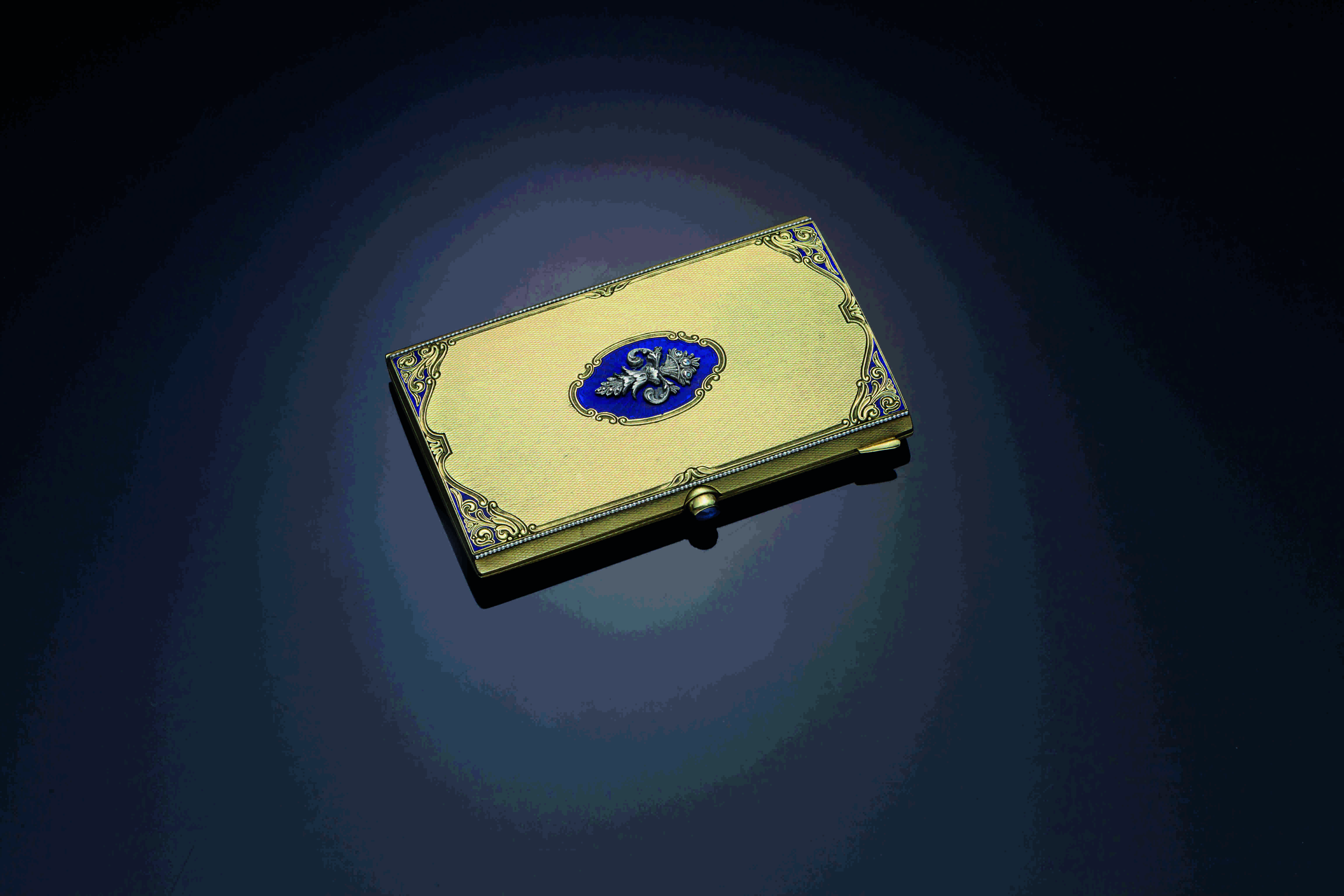 AN 18K GOLD, SILVER AND DIAMOND CASE , MARK OF CARTIER, PARIS, FIRST