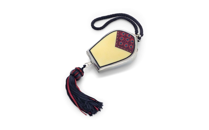 An 18k gold, silver and enamel compact, Mark of Van Cleef and Arpels, Paris, circa 1930. 3⅞  in (9.8  cm) long, the compact. This lot was offered in THE COLLECTOR 19th Century Furniture, Sculpture,