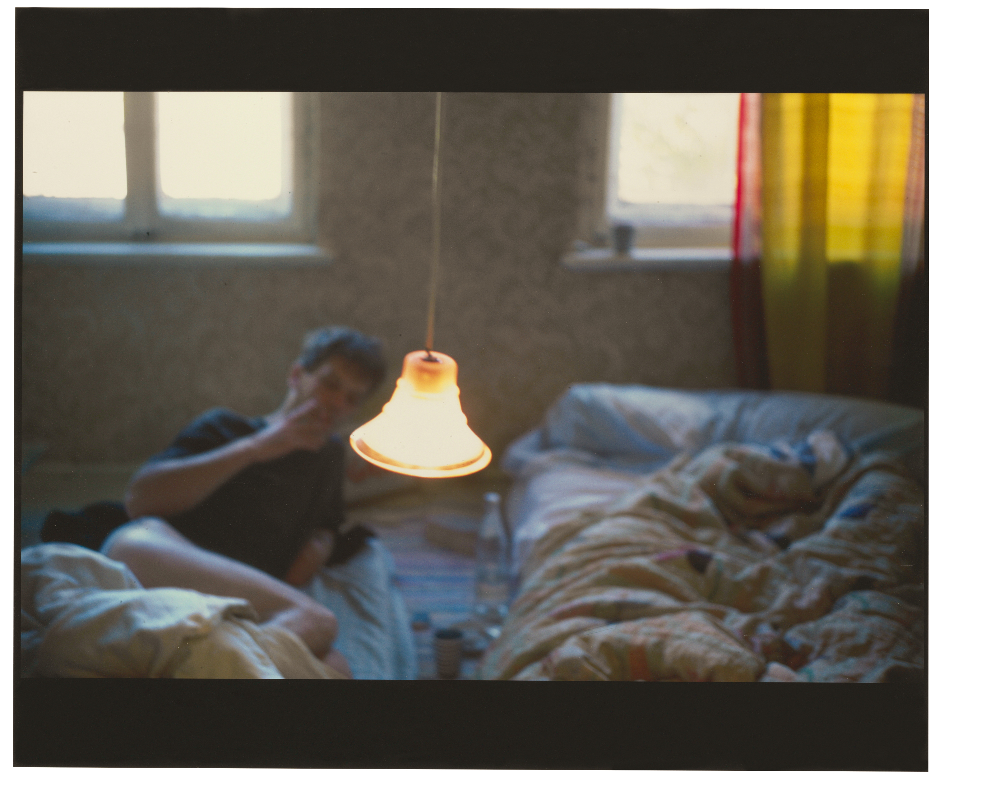 Nan Goldin Nan And Brian In Bed NAN GOLDIN (B. 1953), David in bed Leipzig, Germany, 1992 | Christie’s