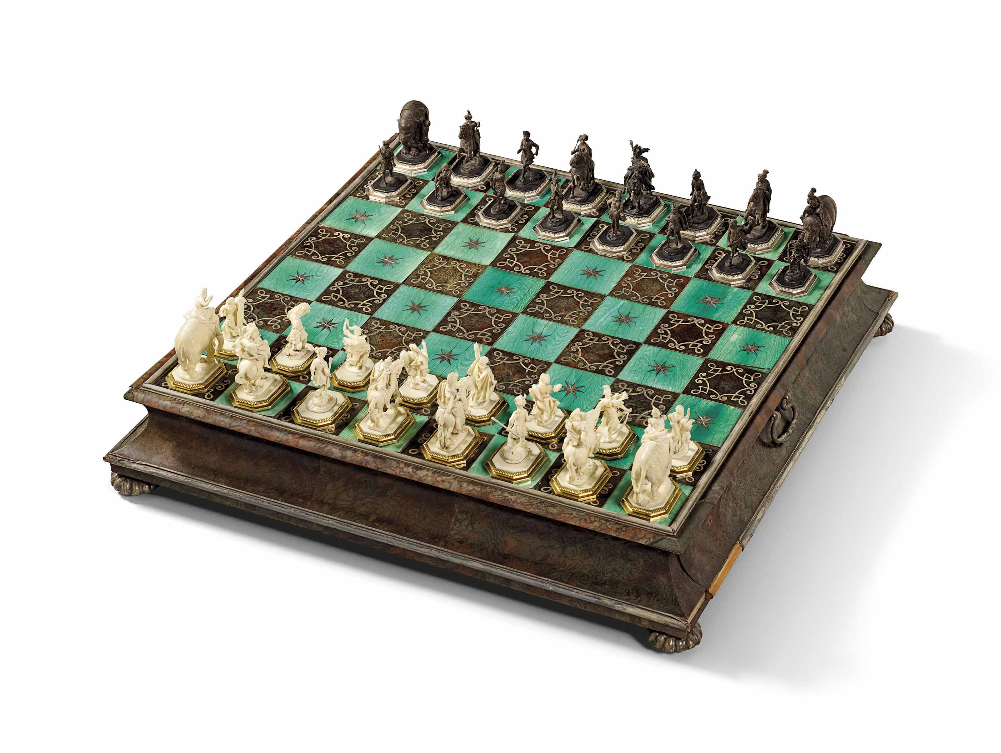 A Silver Inlaid Tortoiseshell Veneered Carved Ivory And Ebonised