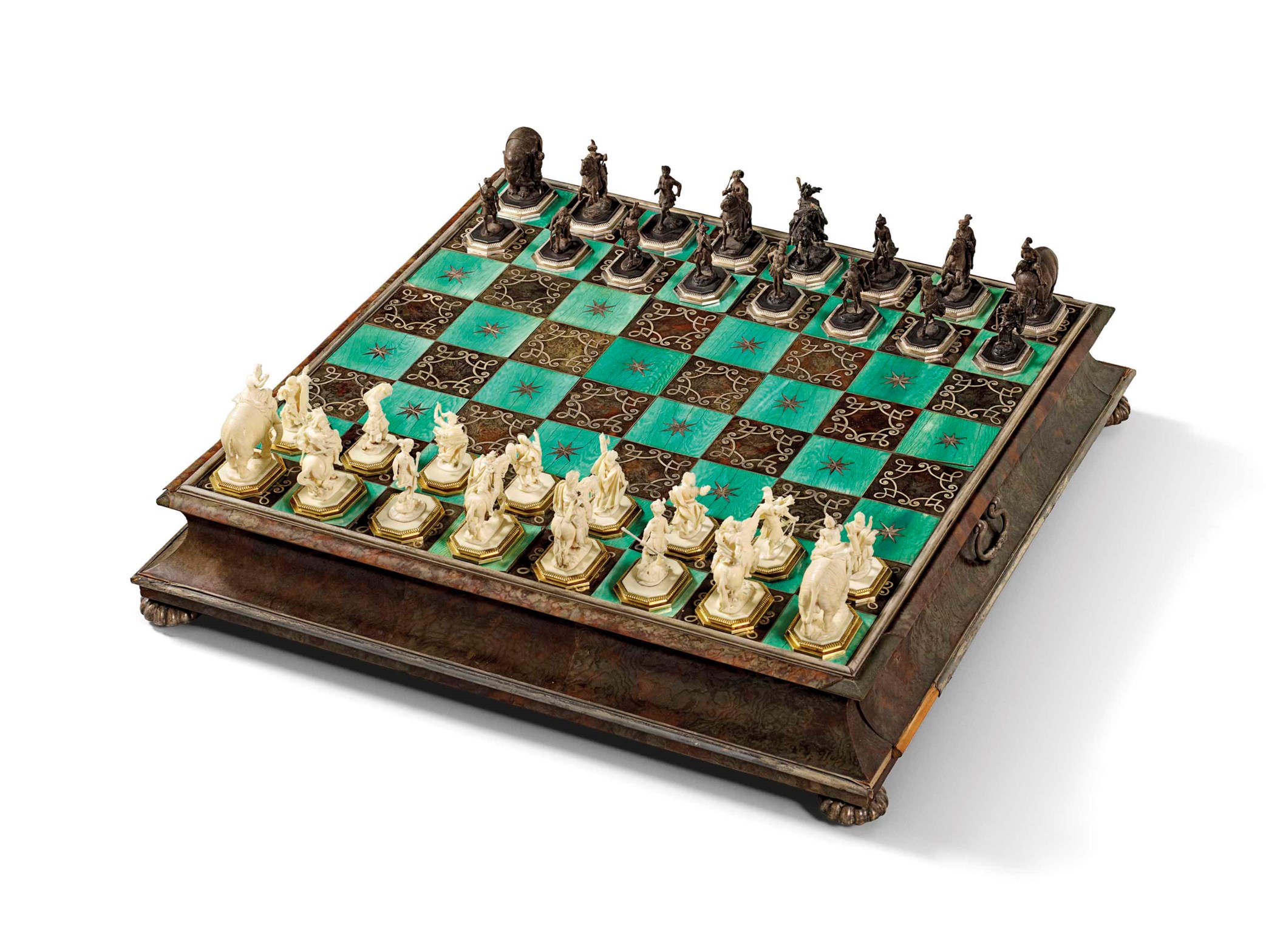 A SILVER-INLAID, TORTOISESHELL-VENEERED, CARVED IVORY AND EBONISED WOOD ...