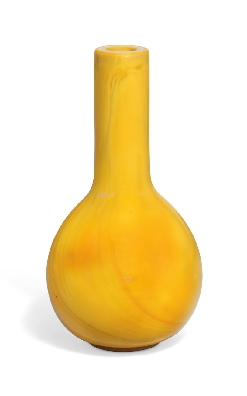 A SMALL OPAQUE YELLOWGLASS BOTTLE VASE