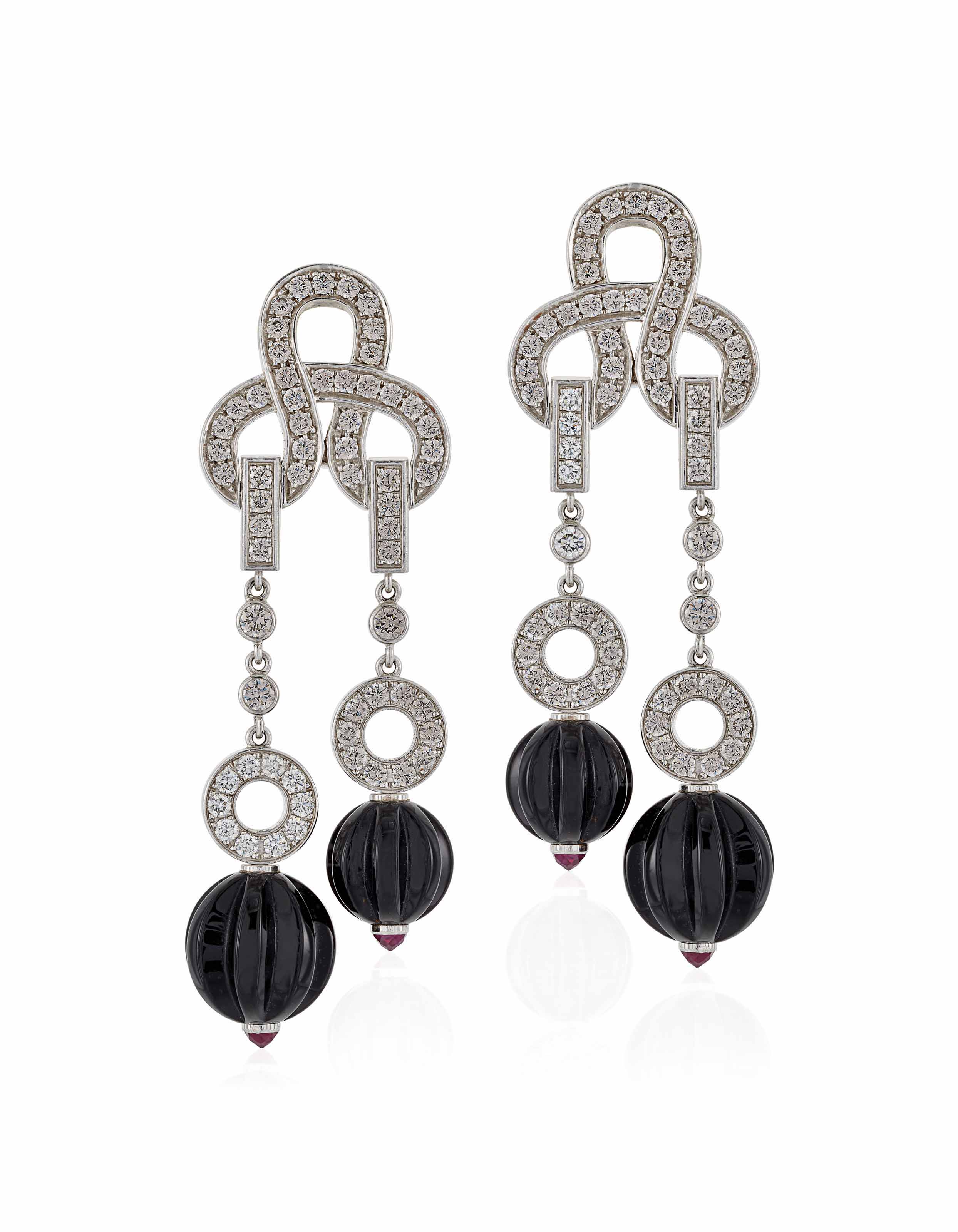 cartier agrafe earrings used