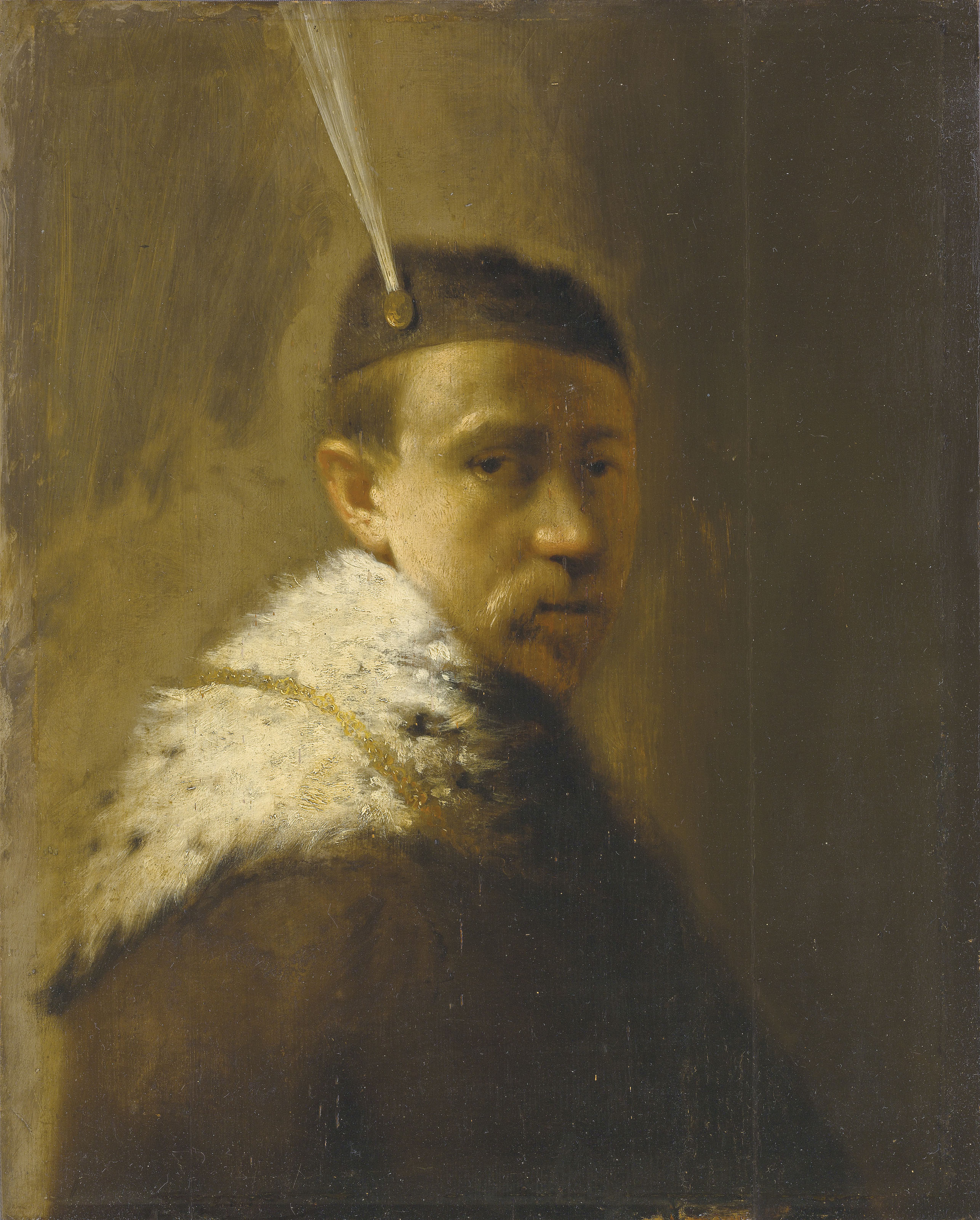 A man in a fur coat and a feathered hat