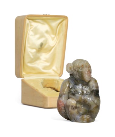 A large and important jewelled petrified wood model of a chimpanzee, by Fabergé, circa 1915, scratched inventory number 24223. 3¾  in (9.7  cm) high. Sold for £106,250 on 4 June 2018 at Christie’s in London