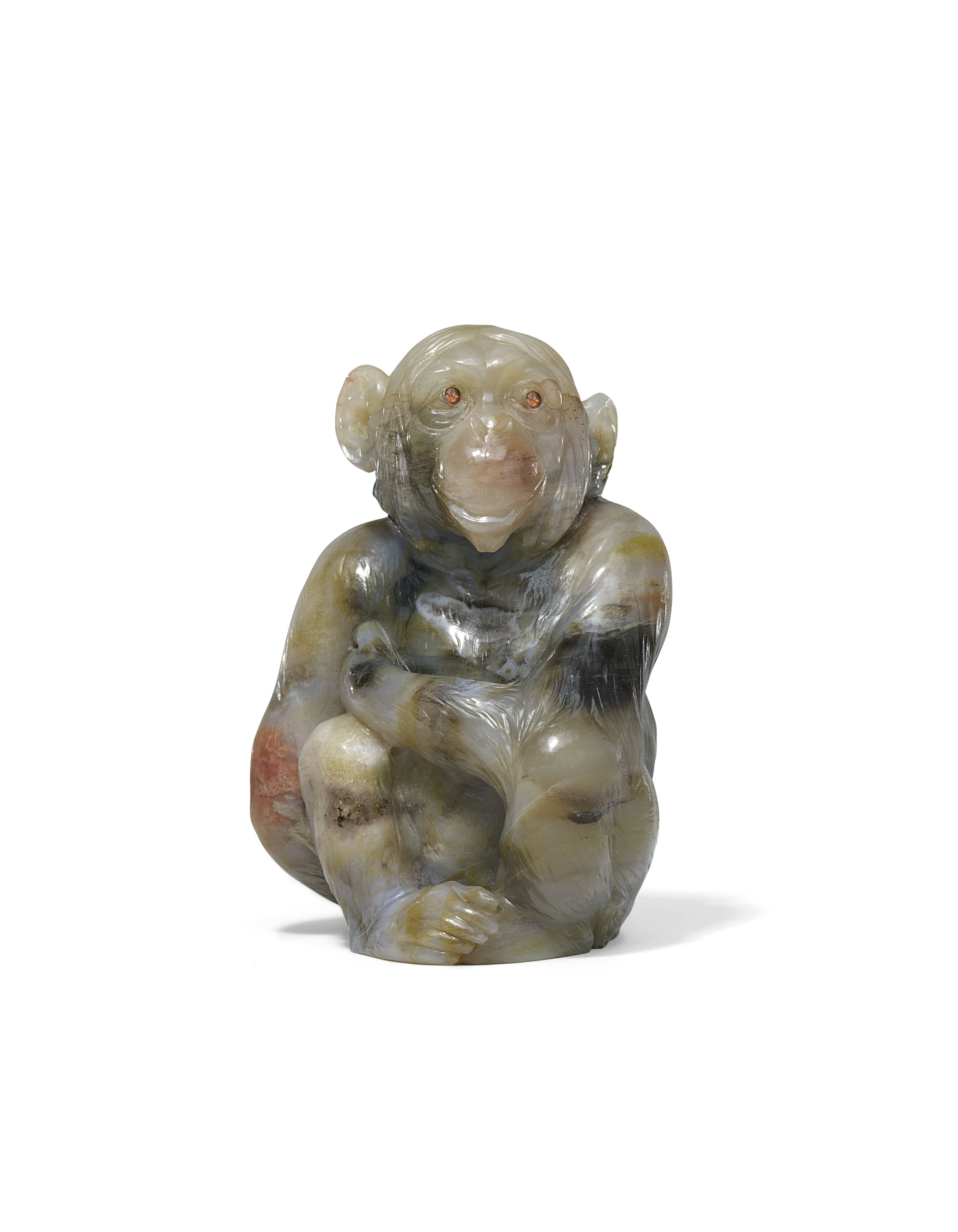 A large and important jewelled petrified wood model of a chimpanzee, by Faberg&eacute;, circa 1915. 3&frac34; in (9.7 cm) high. Sold for &pound;106,250 on 4 June 2018 at Christie&rsquo;s in London