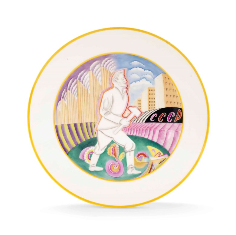 A large and rare Soviet porcelain propaganda platter, by the Imperial Porcelain Factory, St Petersburg, period of Nicholas II, 1906, and the State Porcelain Factory, Petrograd, 1923. After a design by Anton Komashka. 14⅛  in (36  cm) diameter. Sold for £106,250 on 4 June 2018 at Christie’s in London