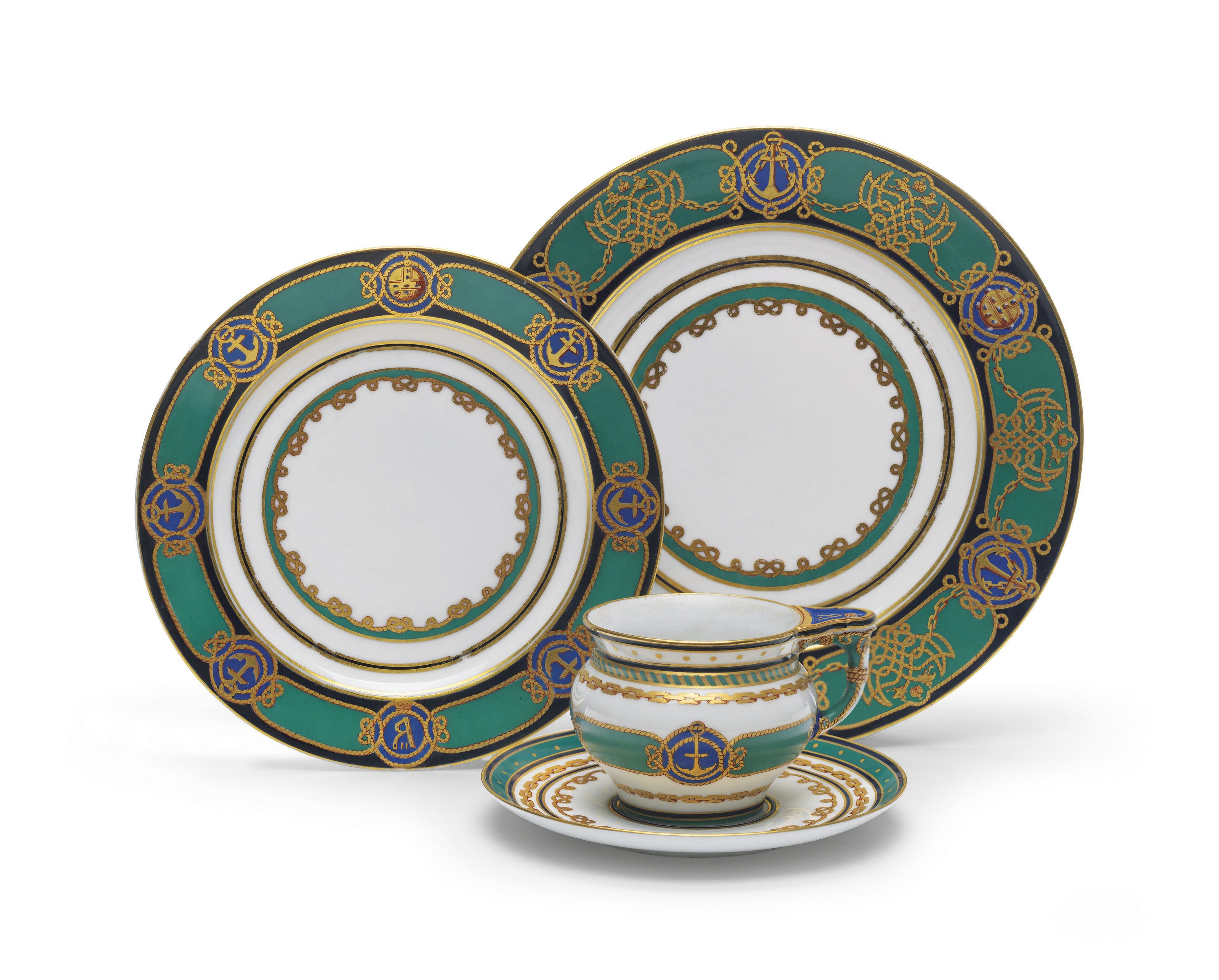 TWO PORCELAIN PLATES AND A CUP AND SAUCER FROM THE IMPERIAL YACHT