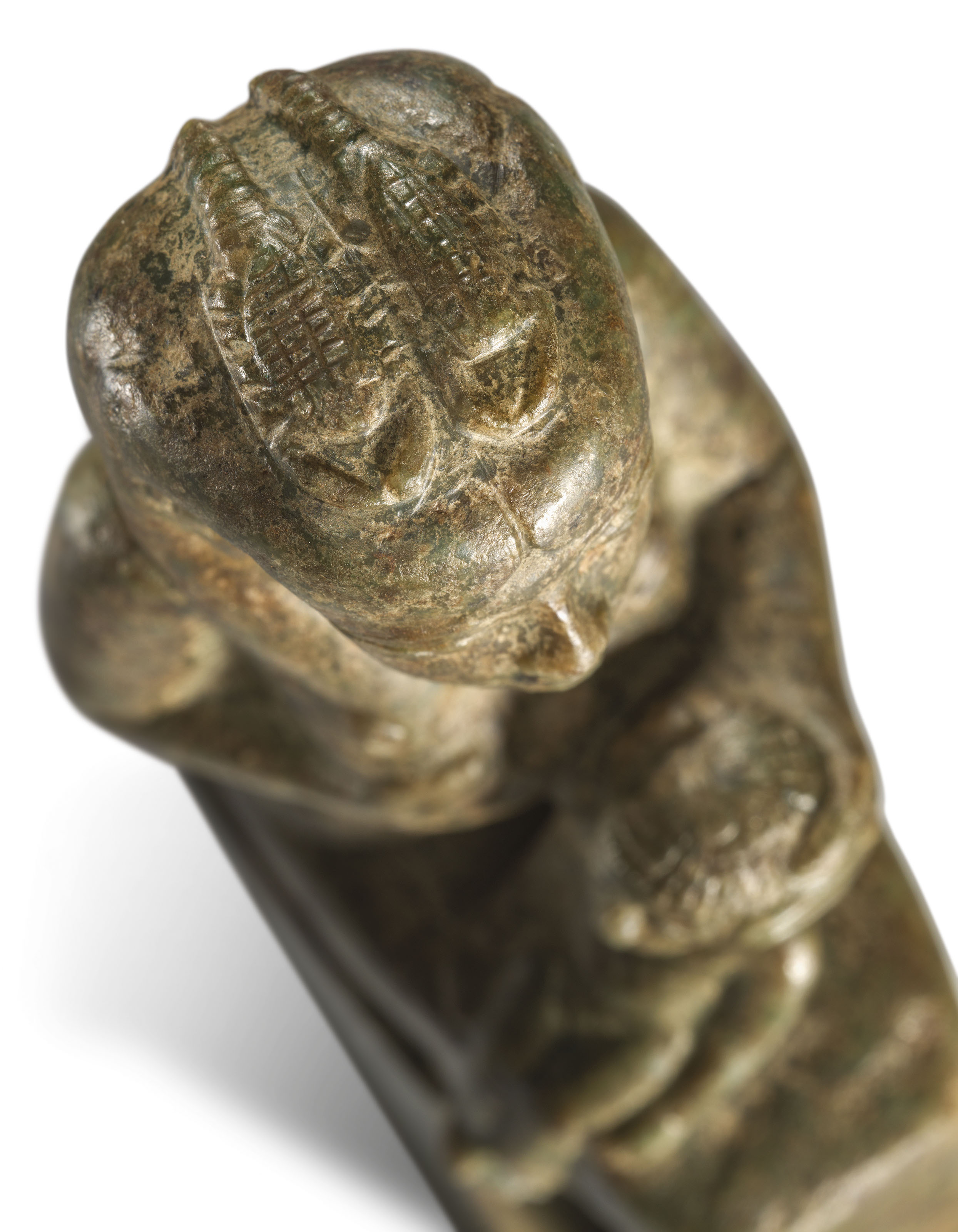 AN EGYPTIAN PERIDOTITE FIGURE OF HEDEDET AND HORUS
