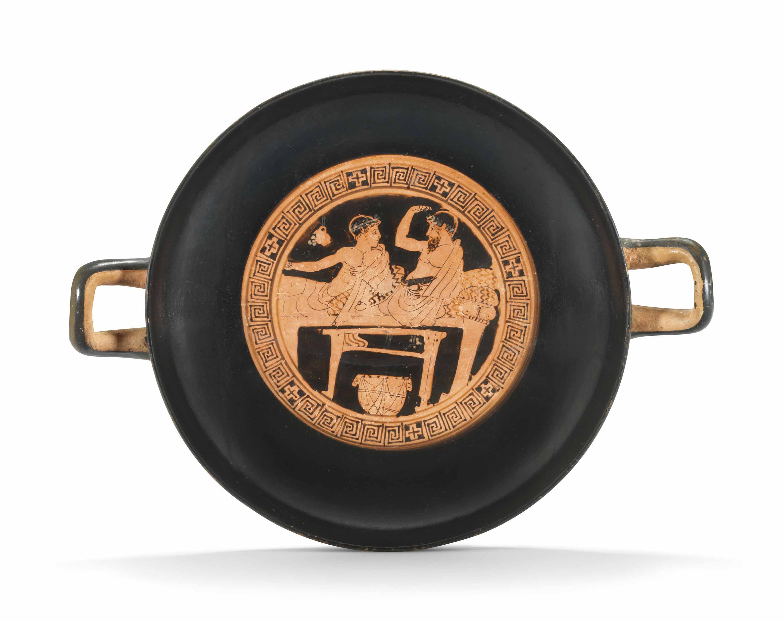 AN ATTIC REDFIGURED KYLIX , ATTRIBUTED TO THE AMPHITRITE PAINTER