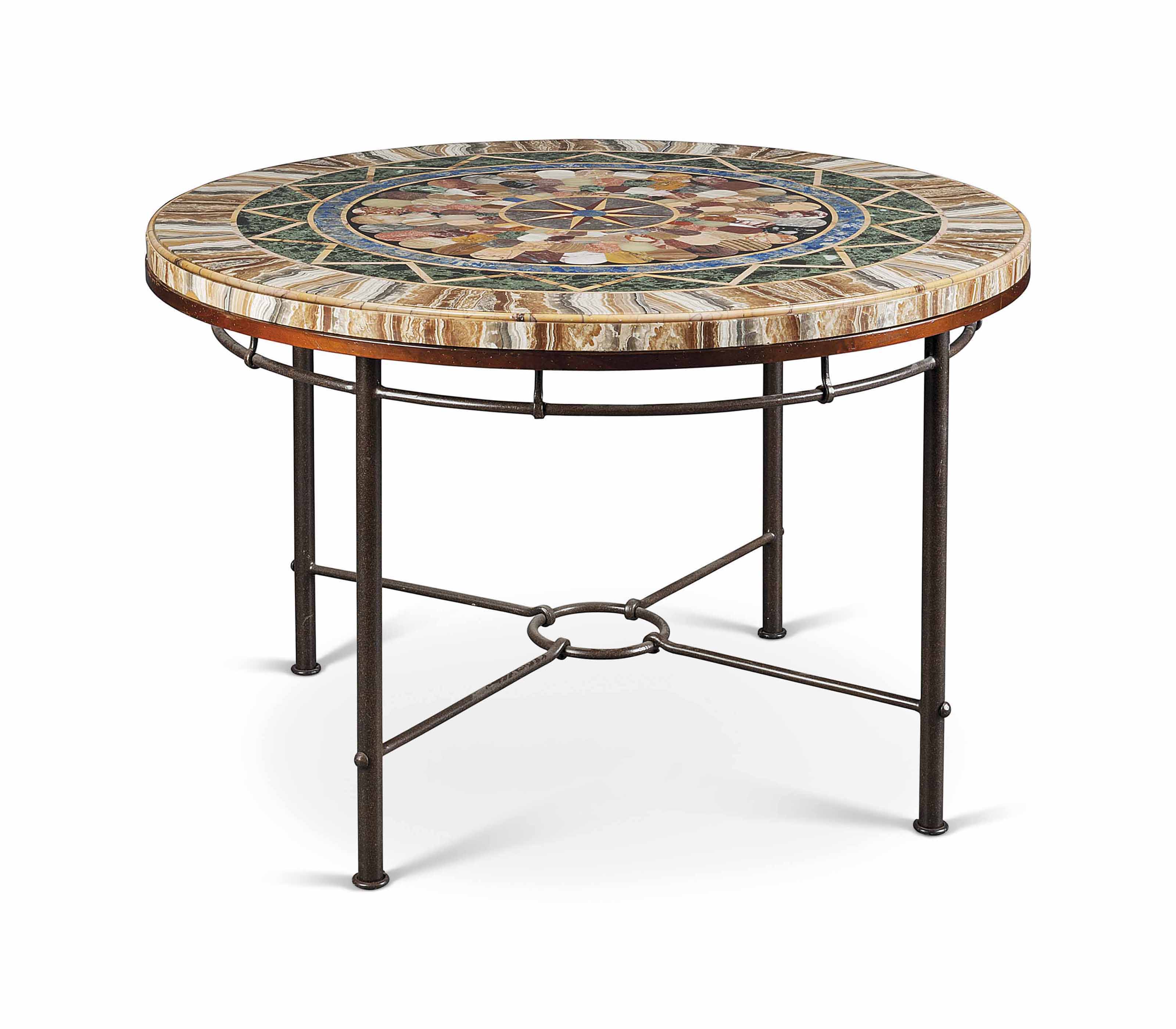 AN ITALIAN SPECIMEN MARBLE CIRCULAR TABLE TOP , 20TH CENTURY Christie's