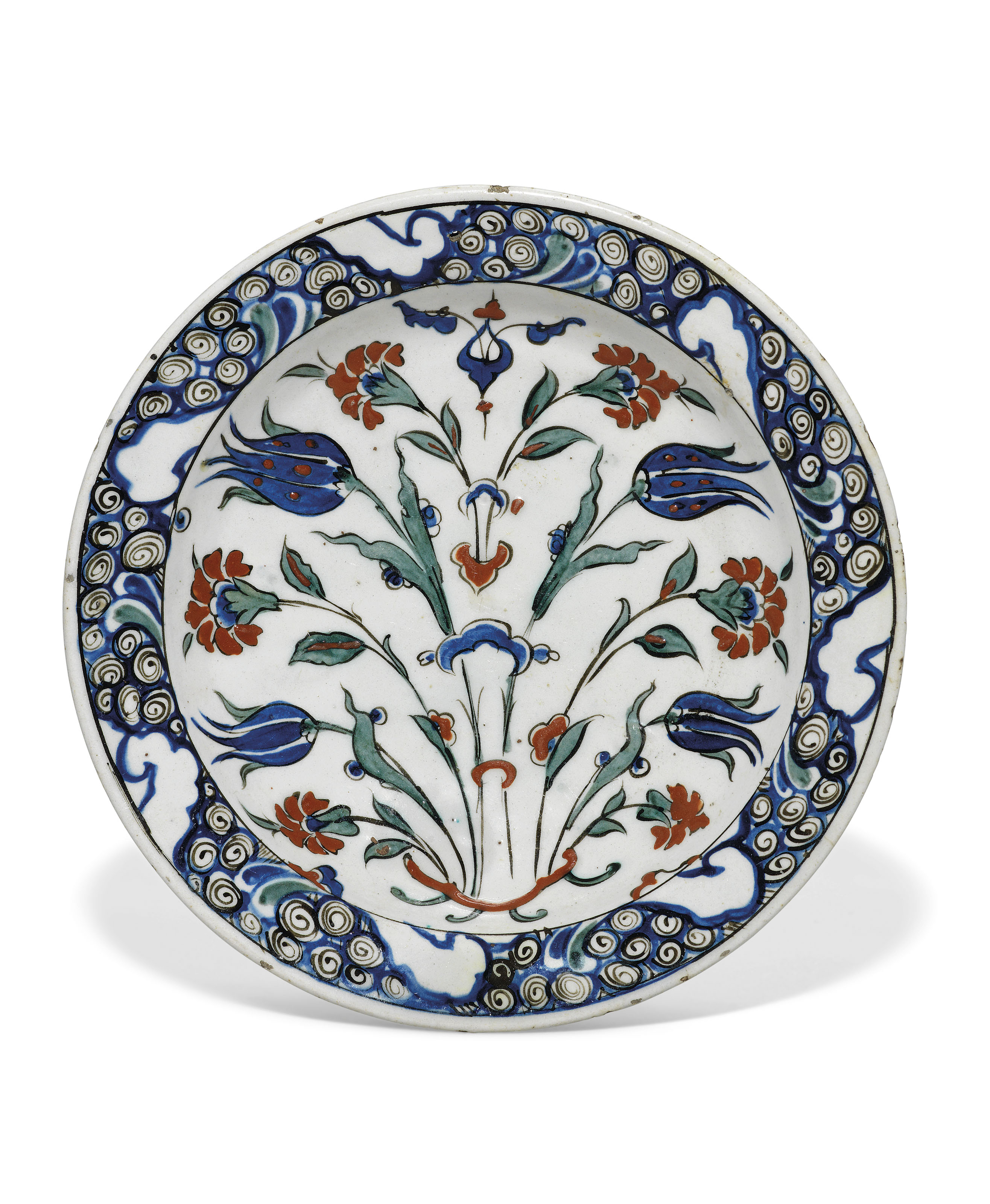 AN IZNIK POTTERY DISH , OTTOMAN TURKEY, CIRCA 1590 Christie's