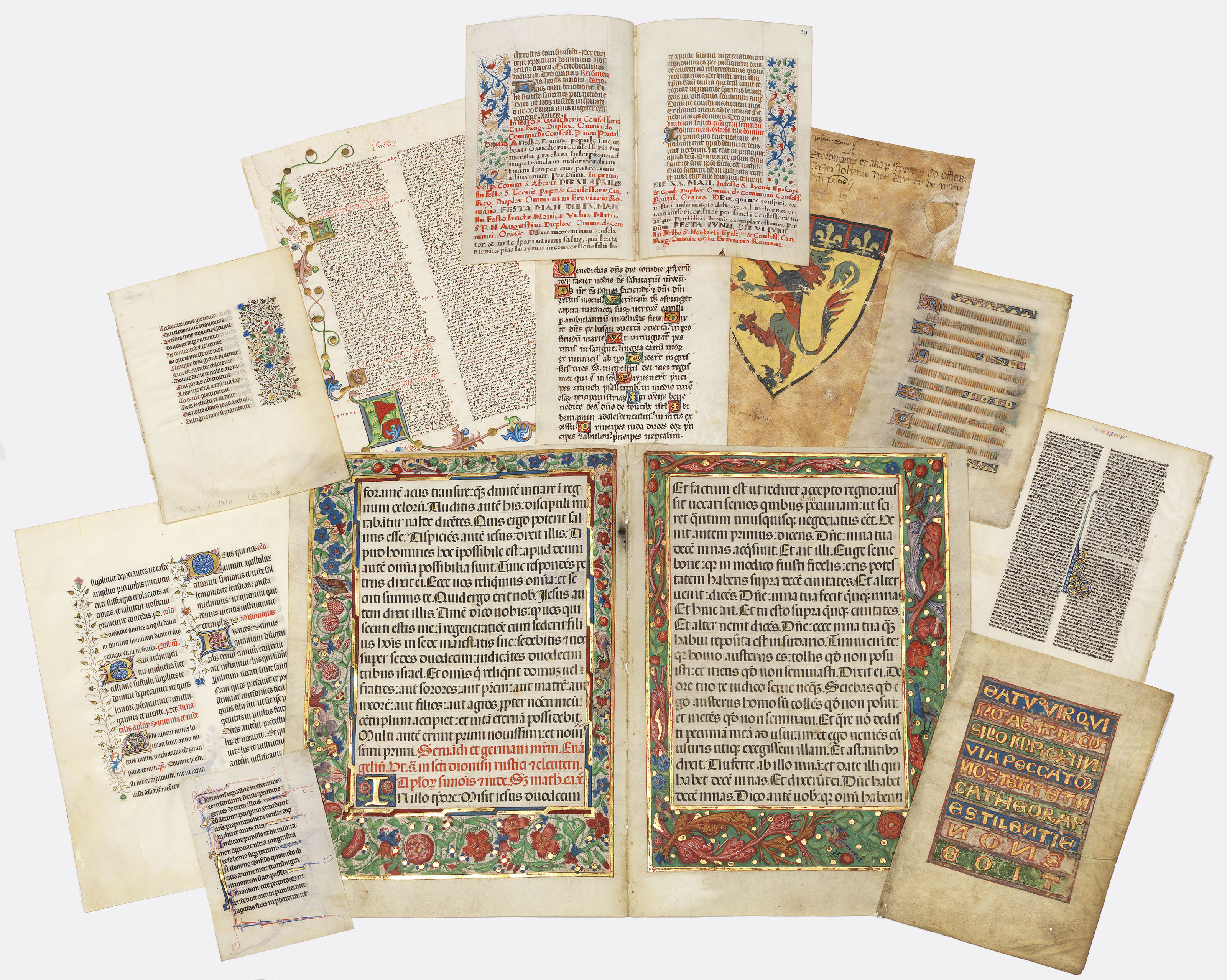 A GROUP OF ILLUMINATED LEAVES AND FRAGMENTS, in Latin, manuscripts on