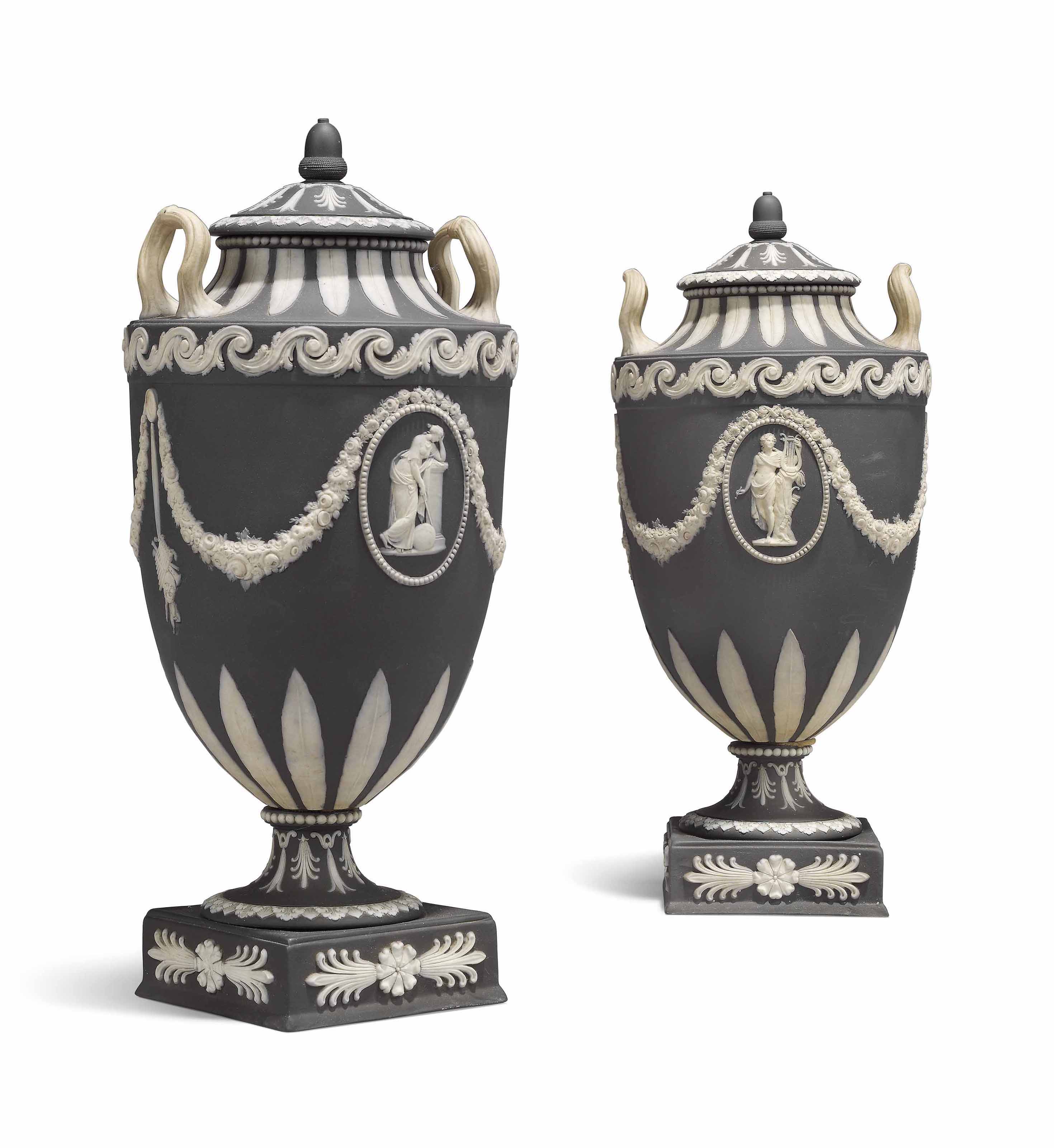 A Pair Of Wedgwood Black Jasperware Two Handled Vases And Covers