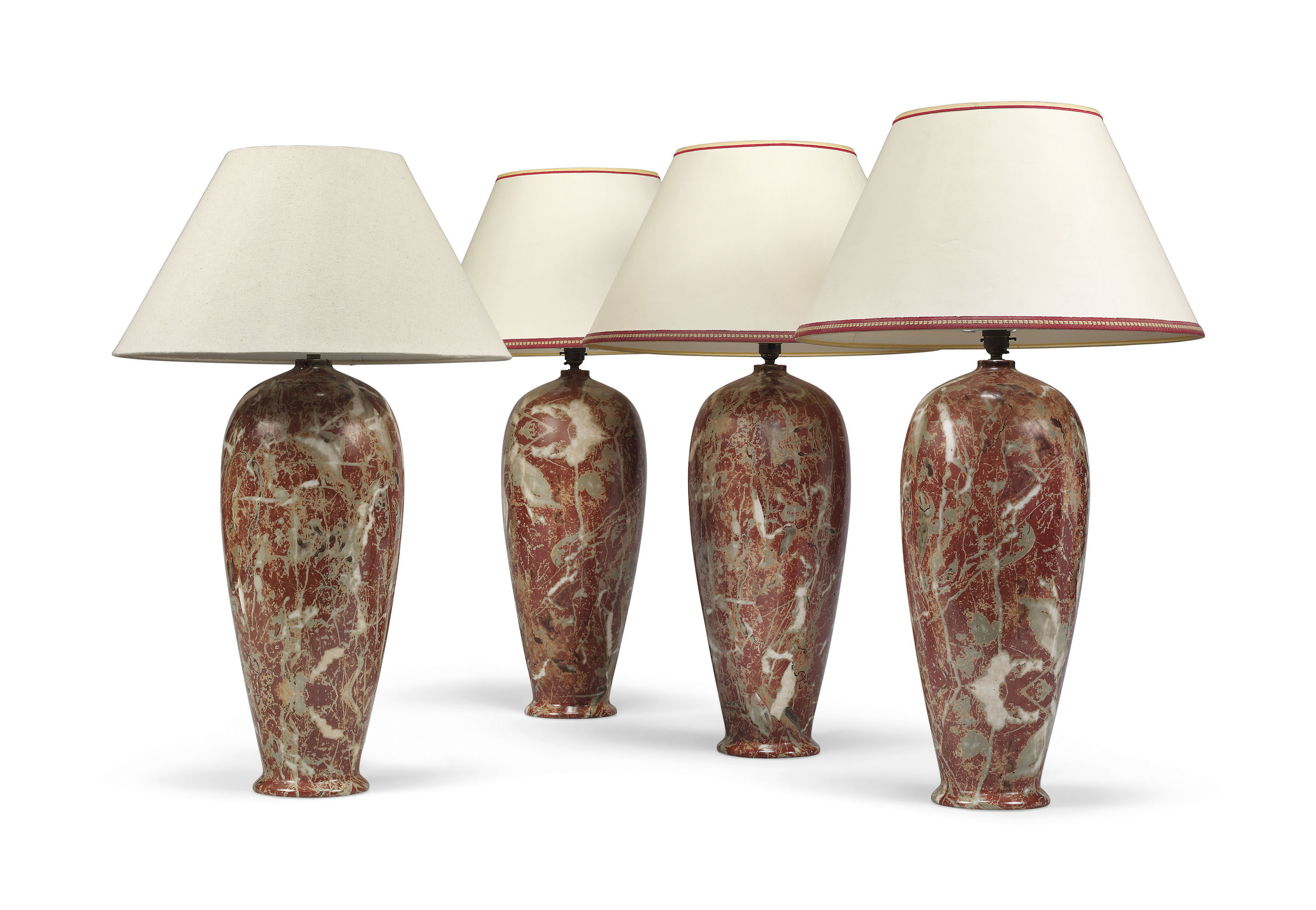 A Set Of Four Italian Simulated Red Marble Table Lamps Base, cap and collar crafted of steel. christie s
