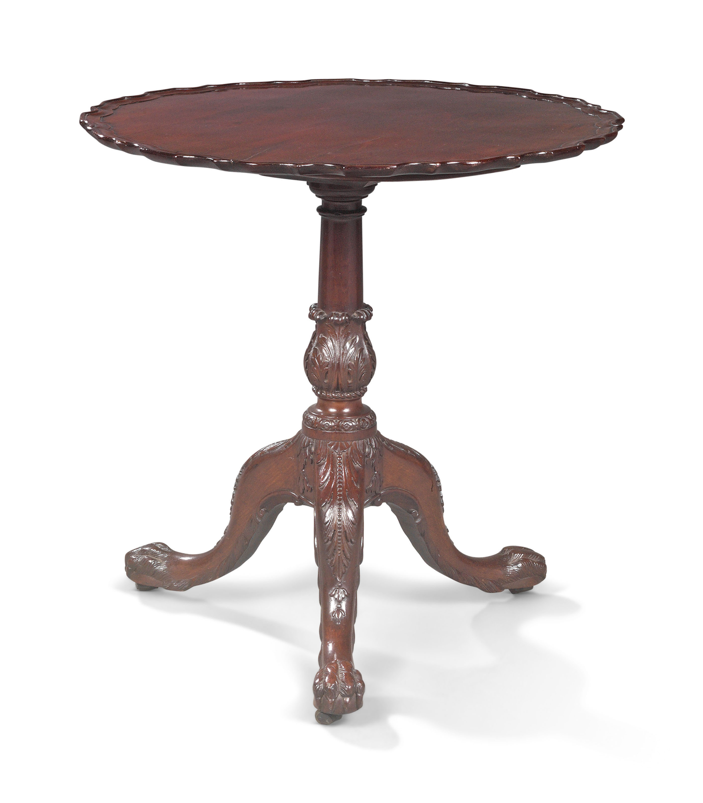 A MAHOGANY TRIPOD TABLE , THE LEGS 19TH CENTURY, THE TOP PROBABLY 18TH