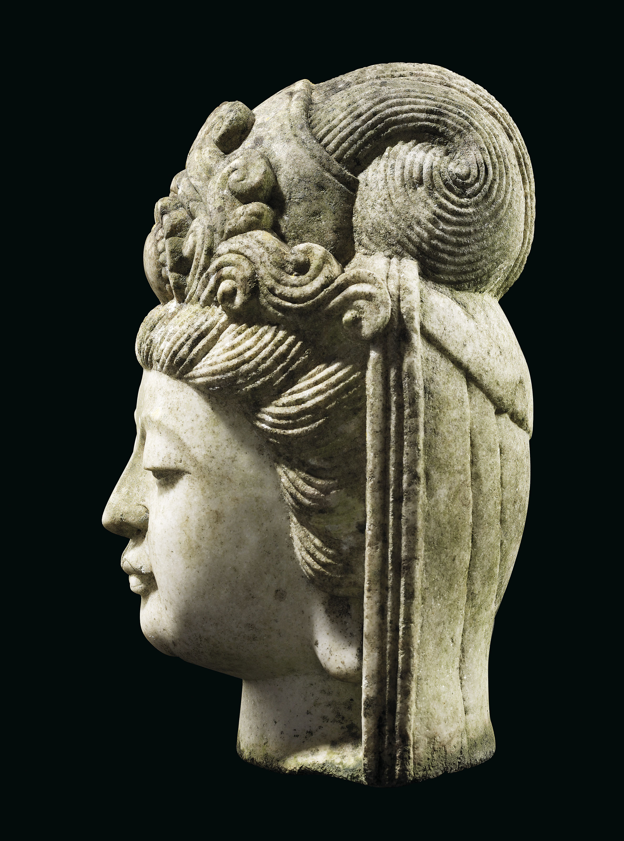 A CHINESE CARVED WHITE MARBLE HEAD OF GUANYIN