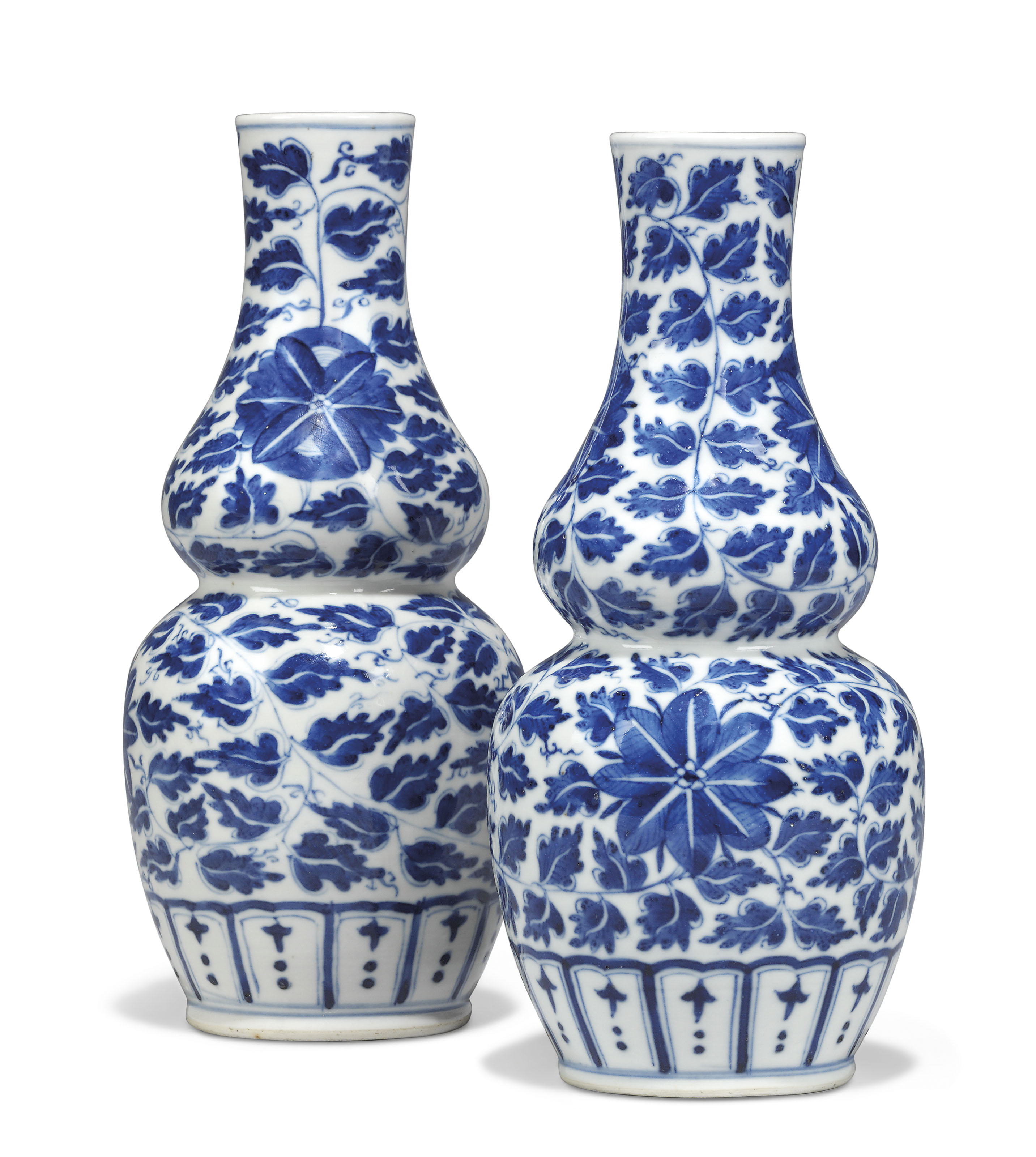 A PAIR OF CHINESE BLUE AND WHITE DOUBLEGOURD VASES , LATE 19TH CENTURY