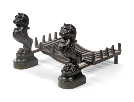A Pair Of Cast Iron Andirons
