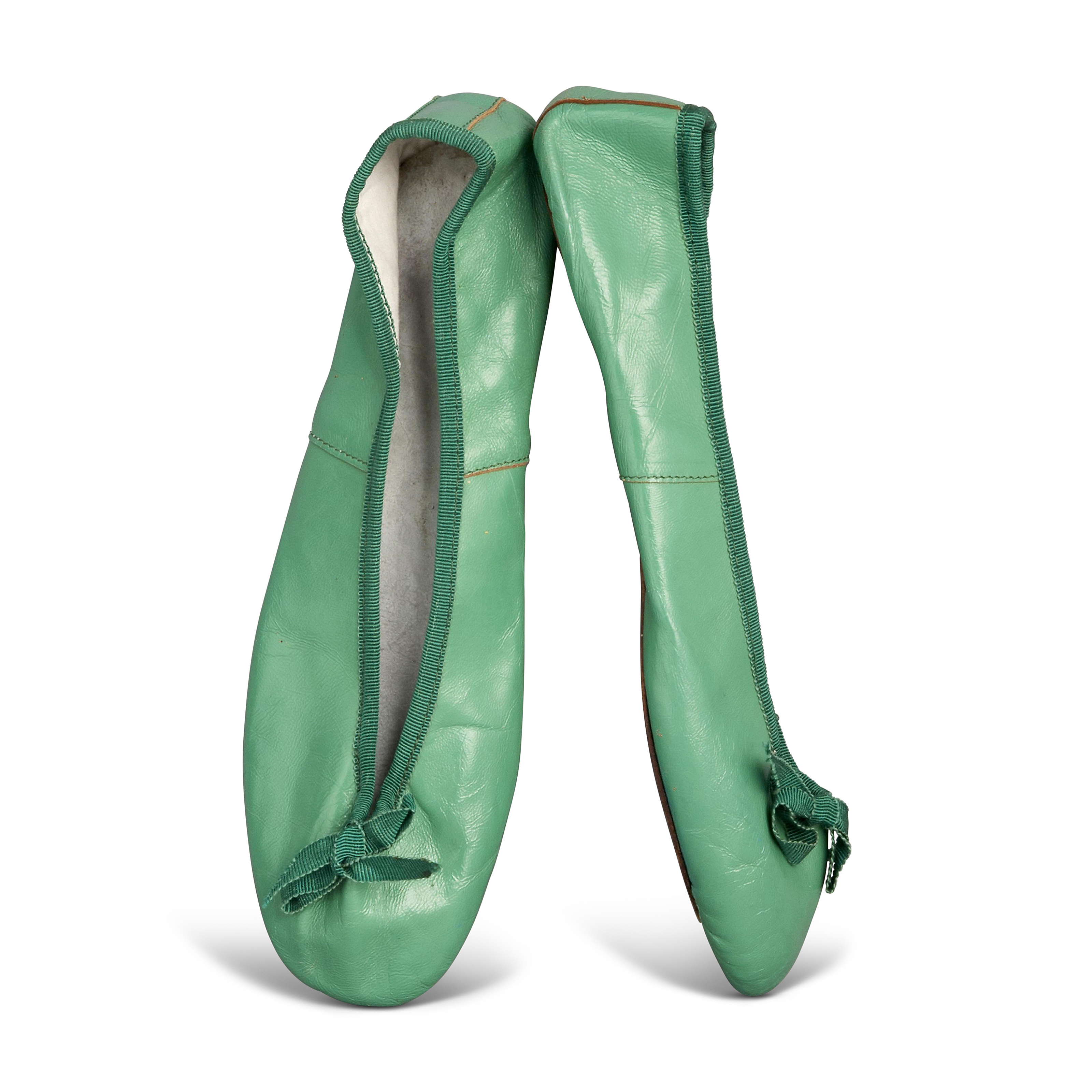 A PAIR OF EMERALD GREEN BALLET PUMPS, CIRCA 196070 Christie’s
