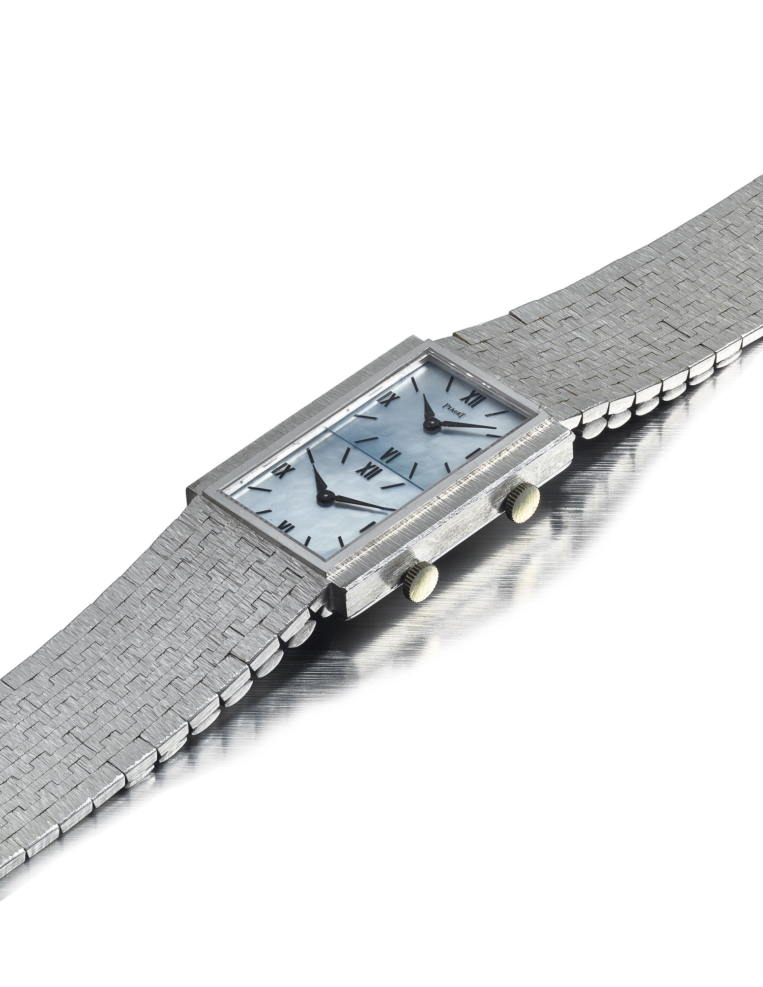 PIAGET. AN 18K WHITE GOLD DUAL TIME RECTANGULAR WRISTWATCH WITH MOTHER