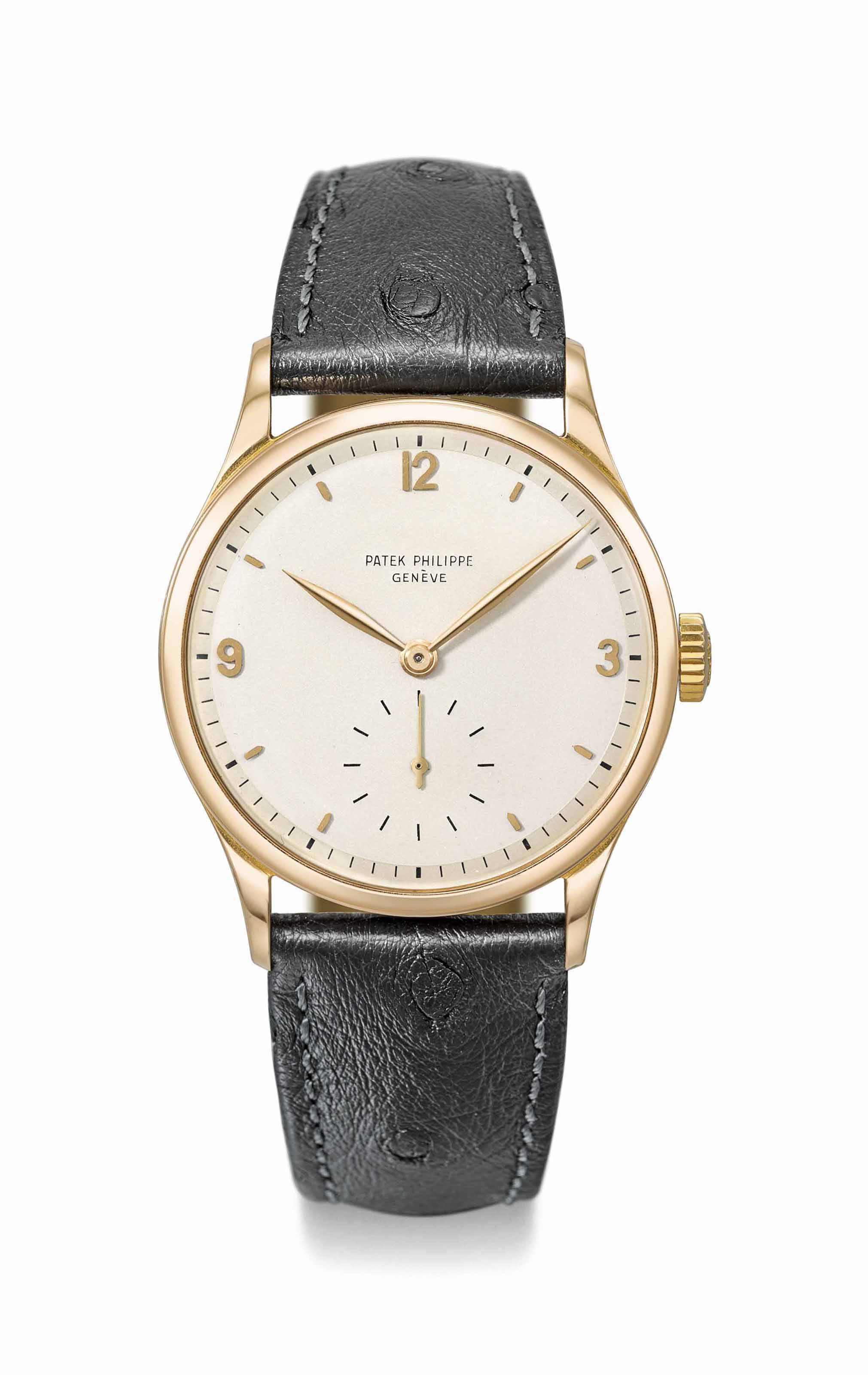 Patek Philippe. A very fine and rare 18K gold automatic perpetual