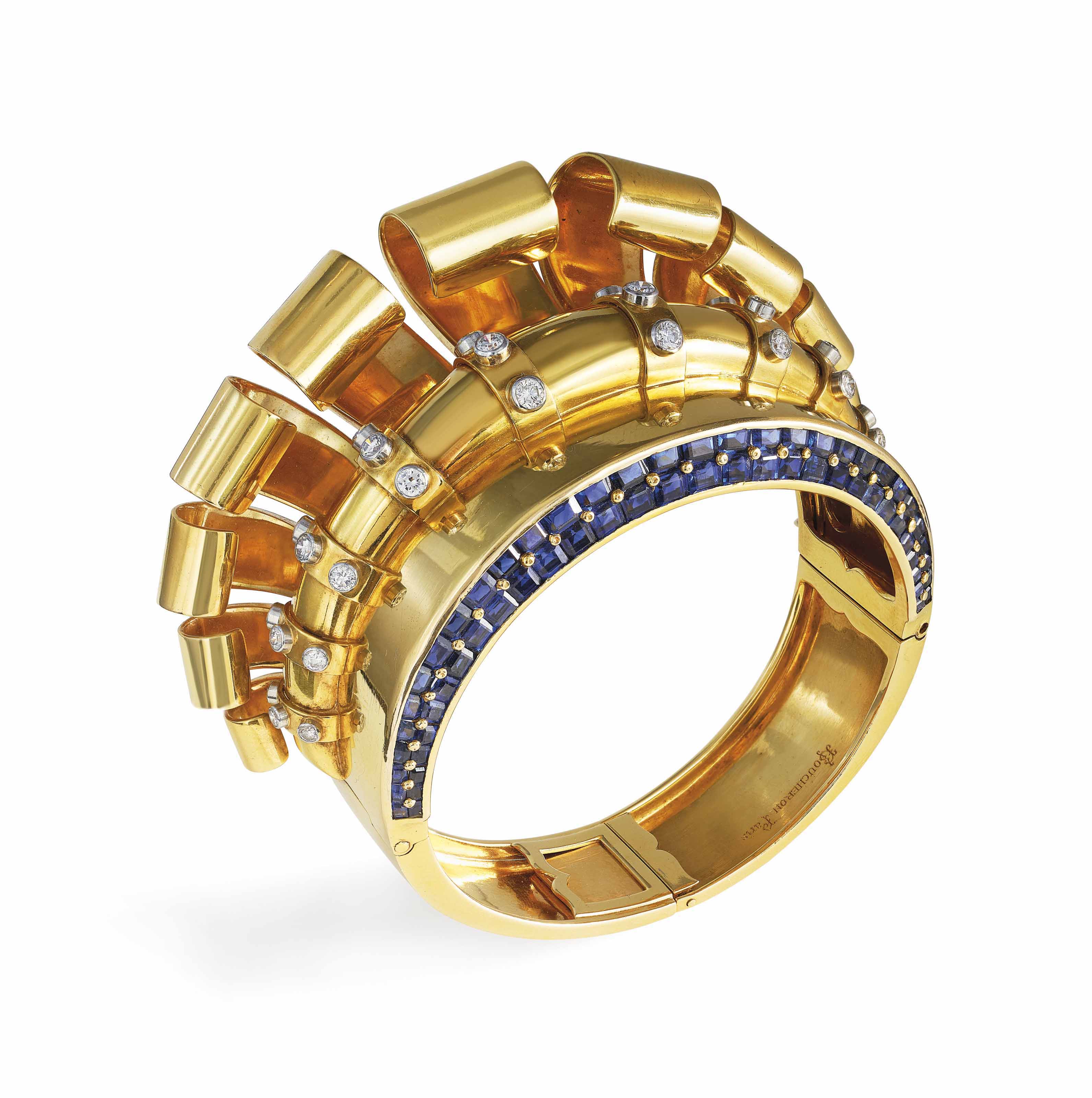Retro sapphire and diamond bangle, Boucheron, c. 1937. Calibré-cut sapphires, circular-cut diamonds, platinum and gold (french marks), inner circumference 17.4 cm, signed Boucheron Paris. Sold for CHF 106,250 on 16 May 2018 at Christie’s in Geneva