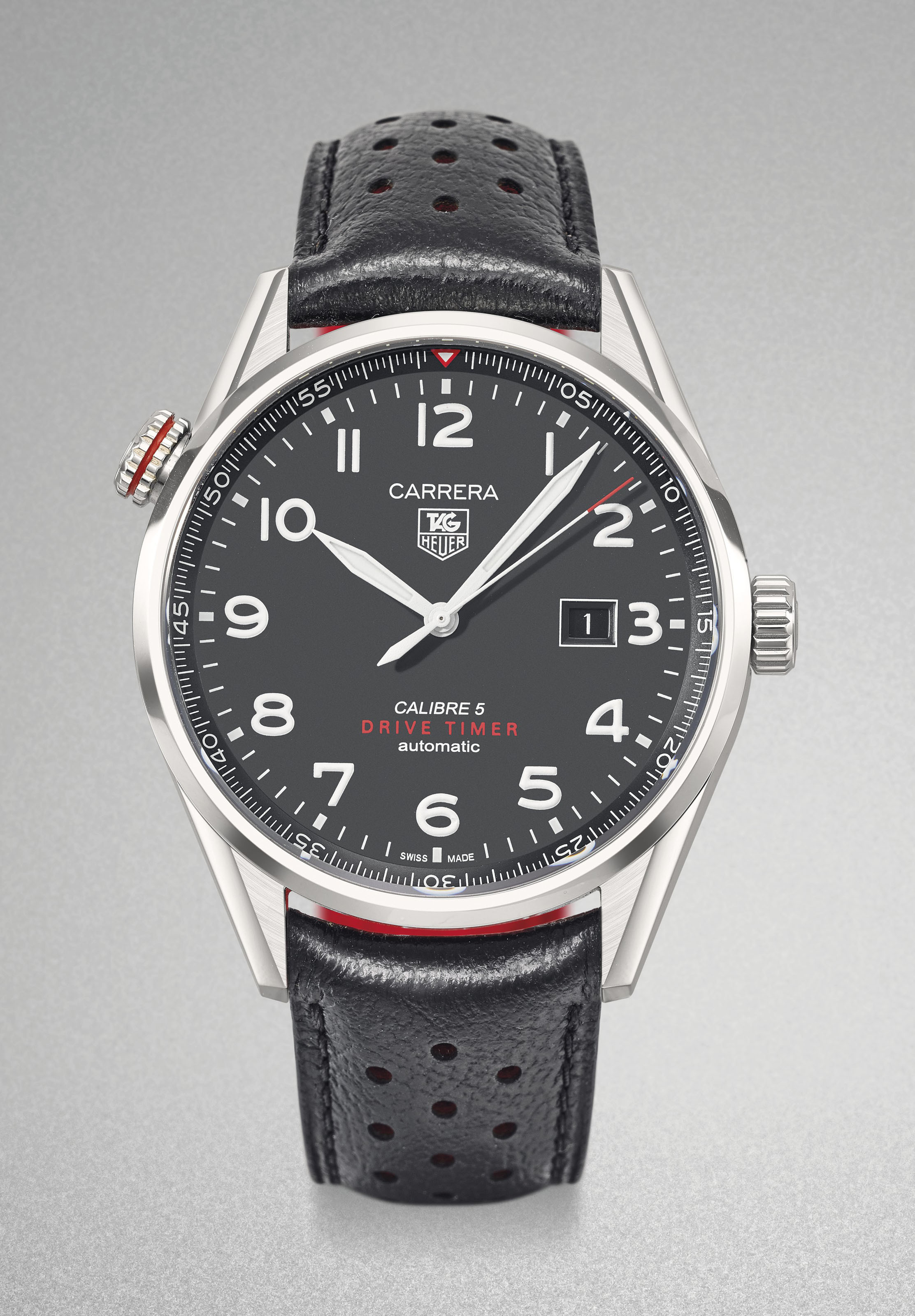 Tag Heuer. A stainless steel automatic wristwatch with sweep centre  seconds, date, two crowns, rotating inner timing scale, original guarantee  and box