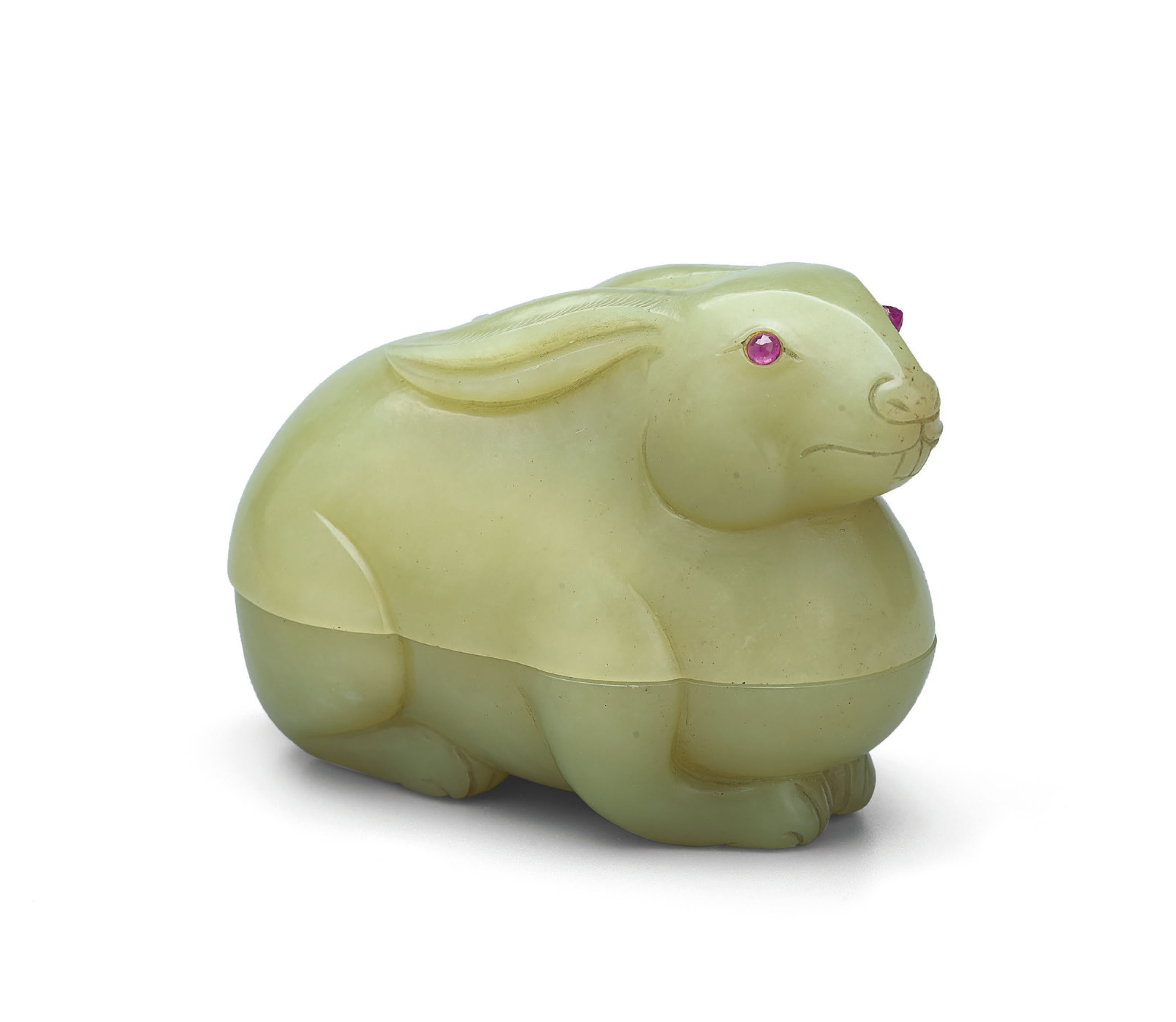 A CARVED YELLOW JADE RABBITFORM BOX AND COVER Christie's