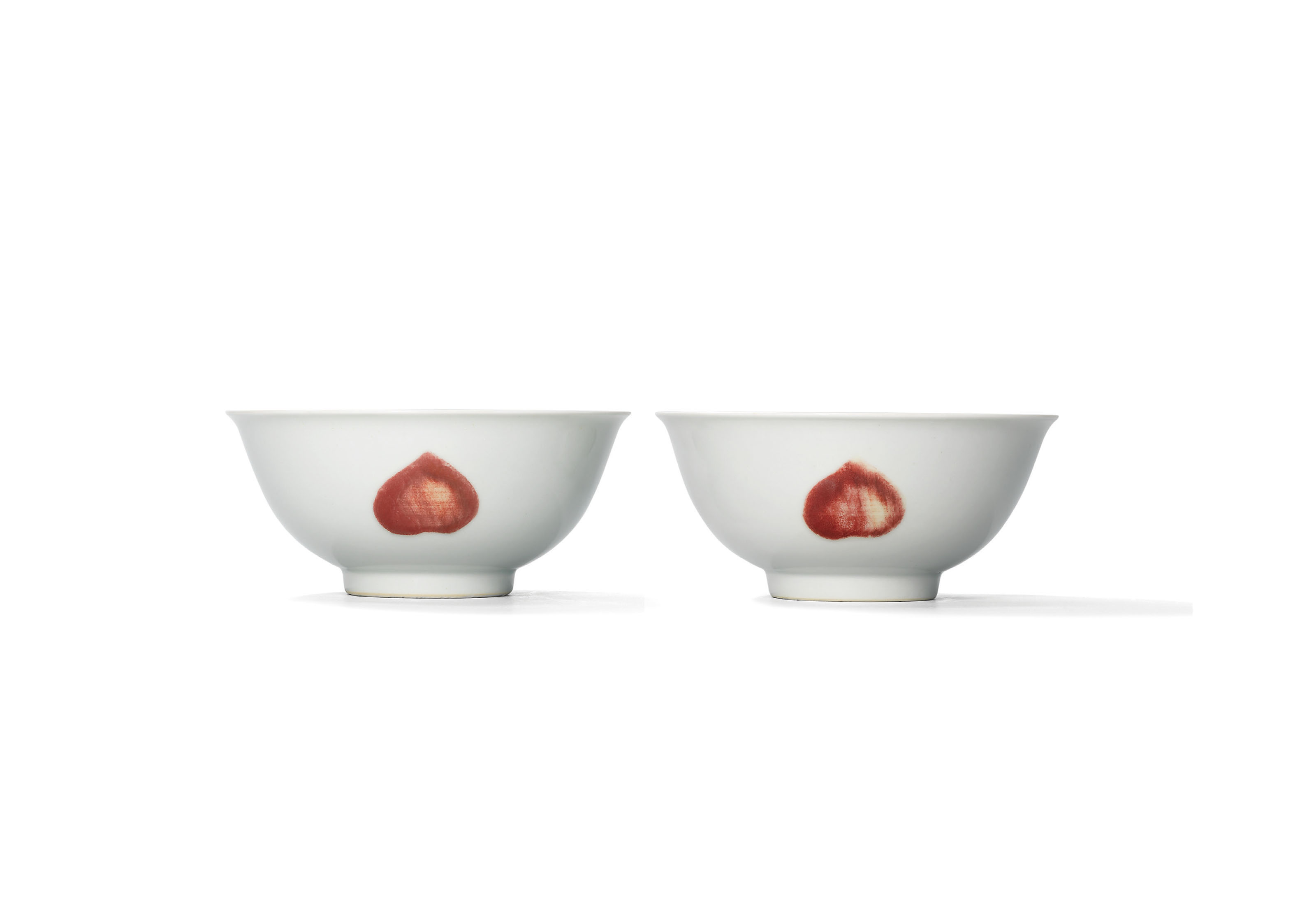 Image result for A rare pair of copper-red decorated 'sanduo' bowls, Kangxi six-character marks in underglaze blue within double circles and of the period (1662-1722)