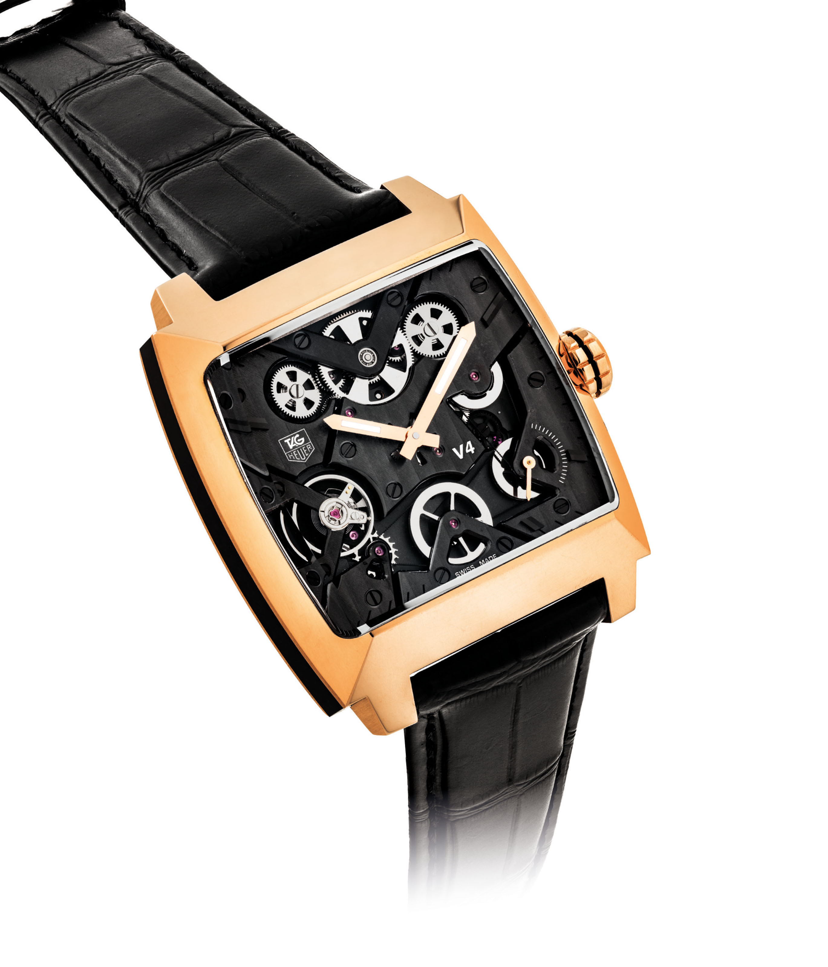 TAG HEUER. AN UNUSUAL FINE AND RARE 18 PINK GOLD AND CERAMIC