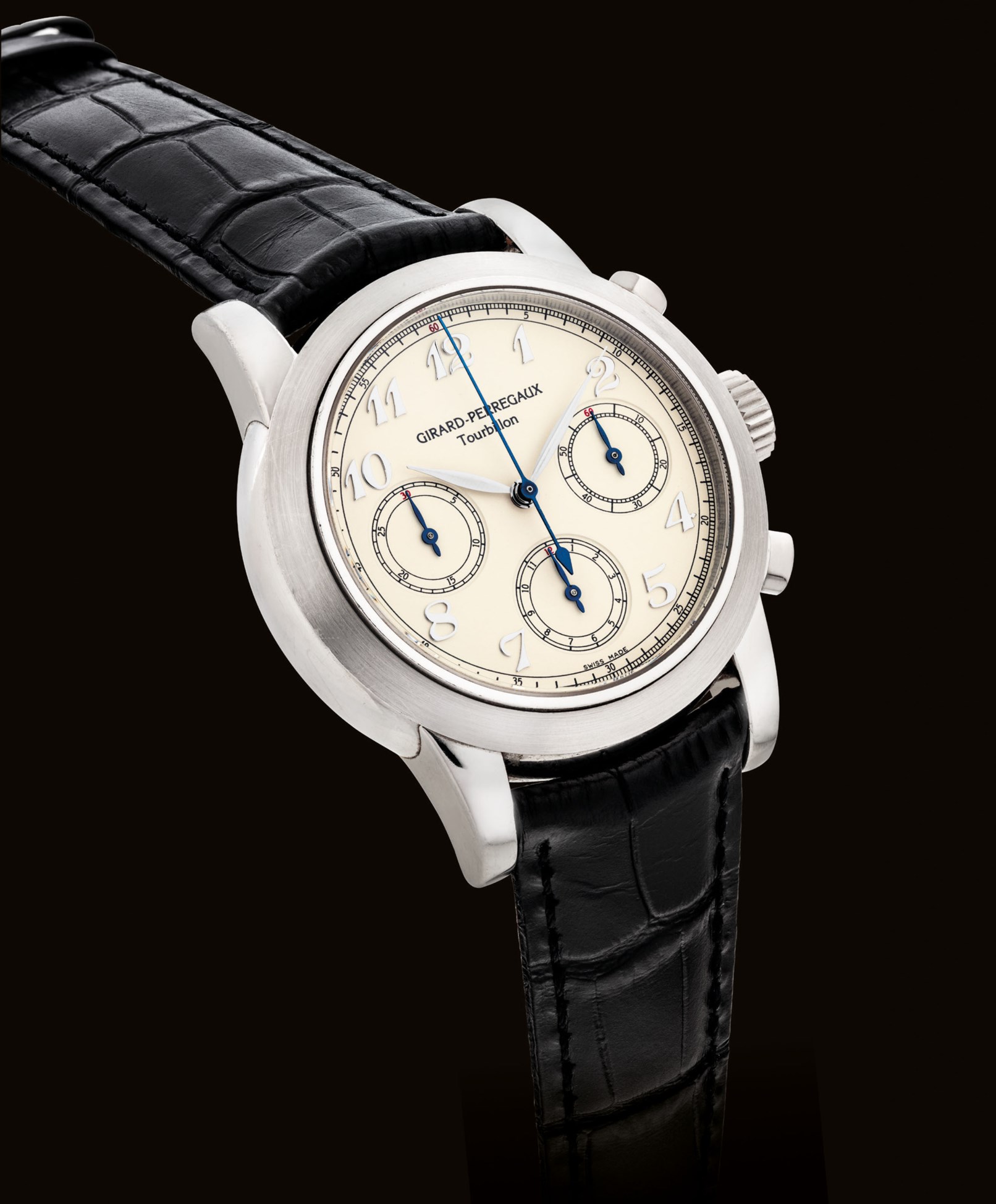 GIRARDPERREGAUX. A RARE AND FINE PLATINUM CHRONOGRAPH THREE GOLD