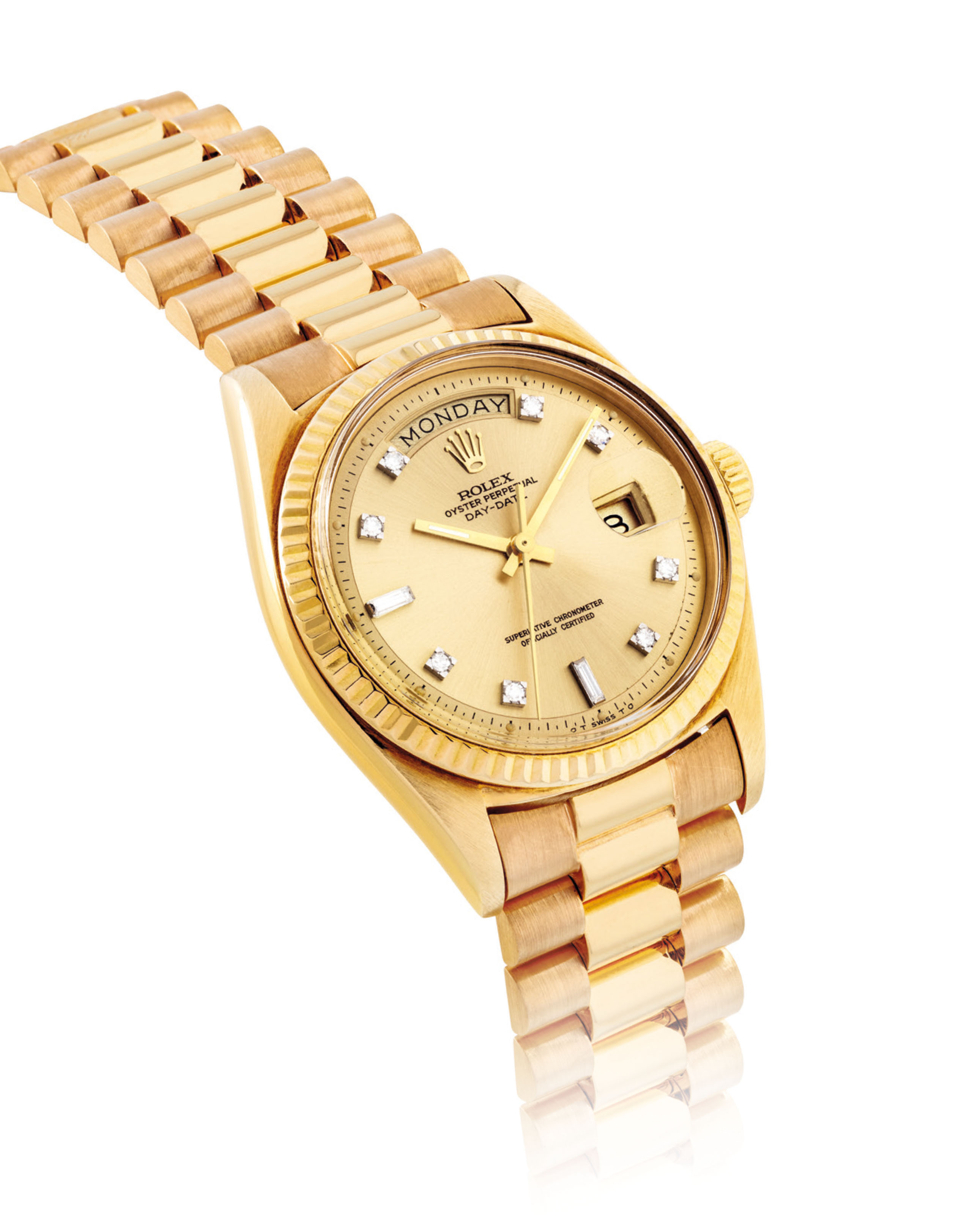 ROLEX. A RARE AND UNUSUAL 18K GOLD AUTOMATIC WRISTWATCH WITH SWEEP CENTRE SECONDS DAY DATE AND JAPANESE CALENDAR SIGNED ROLEX OYSTER PERPETUAL DAY DATE MODEL REF. 1803 CASE NO. 816 422 CIRCA 1962 Chri...