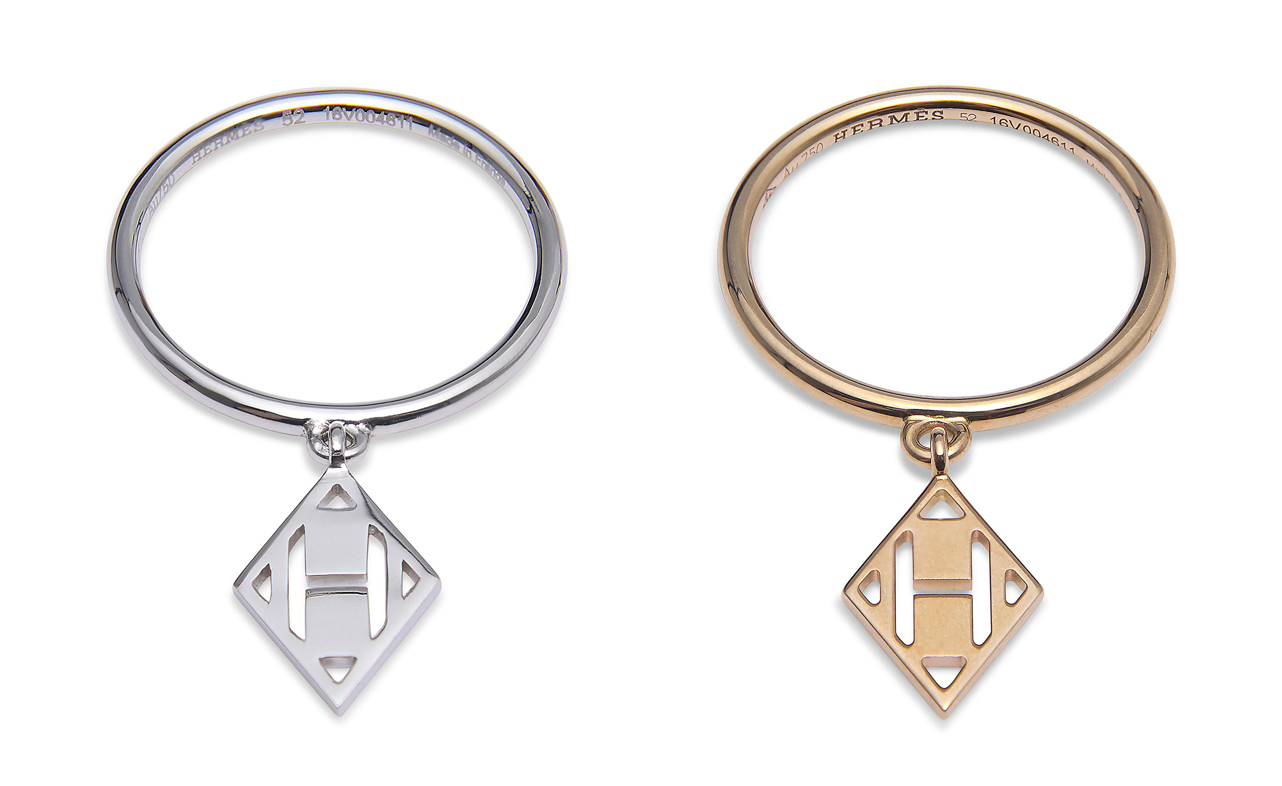 A SET OF TWO A WHITE GOLD GAMBADE RING A ROSE GOLD GAMBADE RING