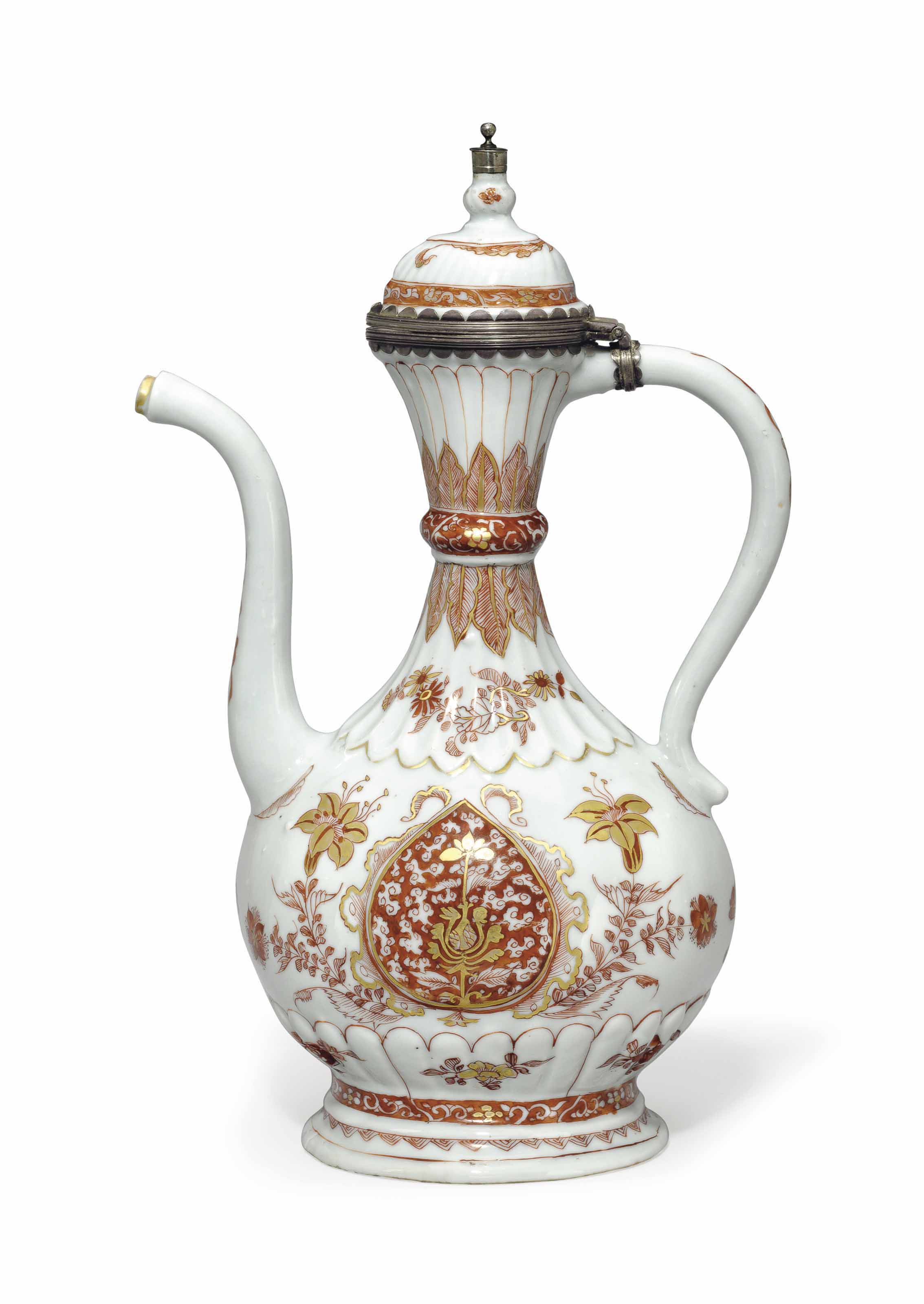 A rare iron-red and gilt ewer and hinged cover, Kangxi period (1662-1722). 13&frac14;  in (33  cm) high. Estimate: $15,000-20,000. This lot is offered in Chinese Export Art Featuring 100 lots from Marchant, est 1925 on 18 January 2018  at Christie&rsquo;s in New York