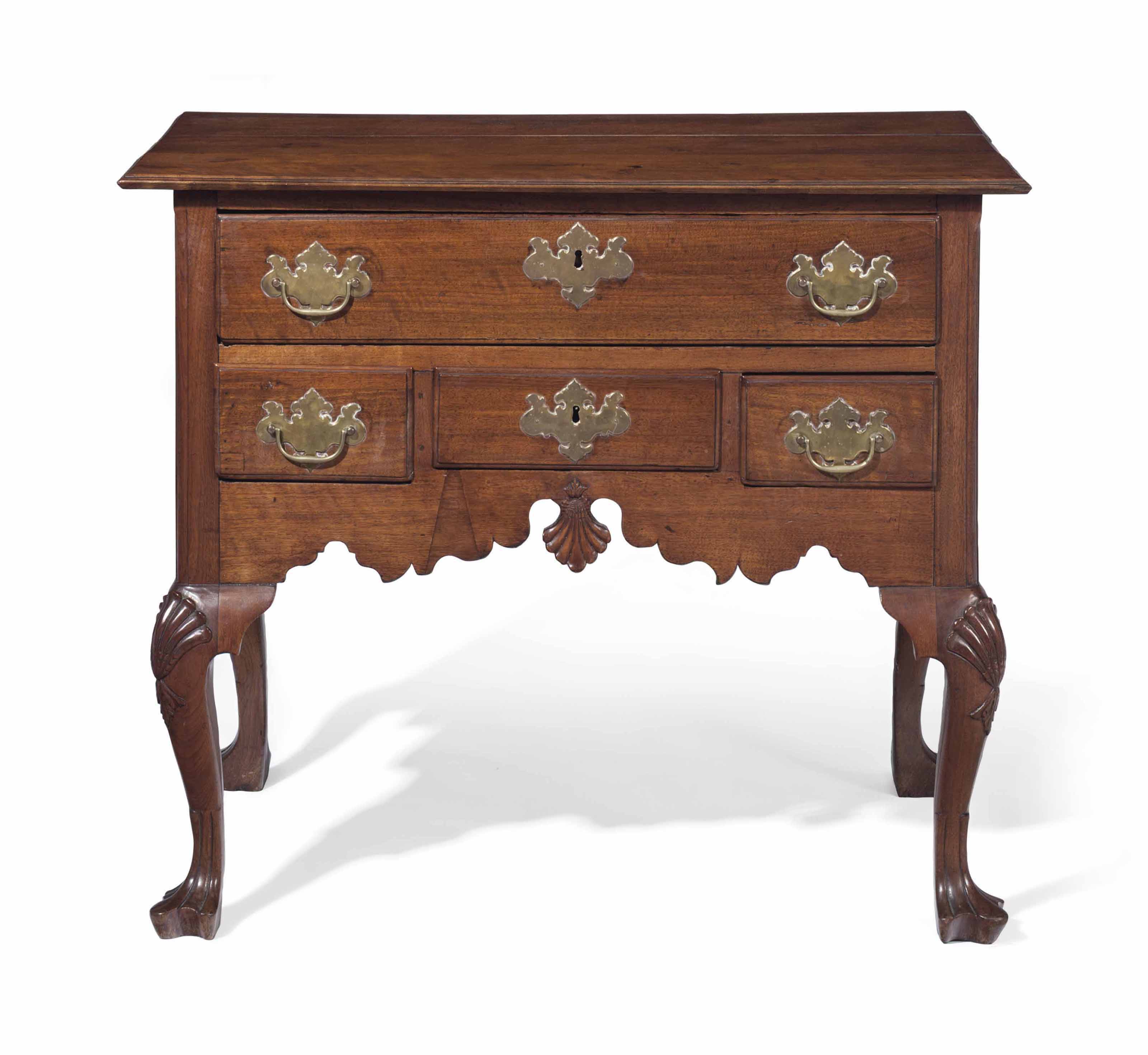 A QUEEN ANNE CARVED WALNUT DRESSING TABLE , PENNSYLVANIA, 17501770