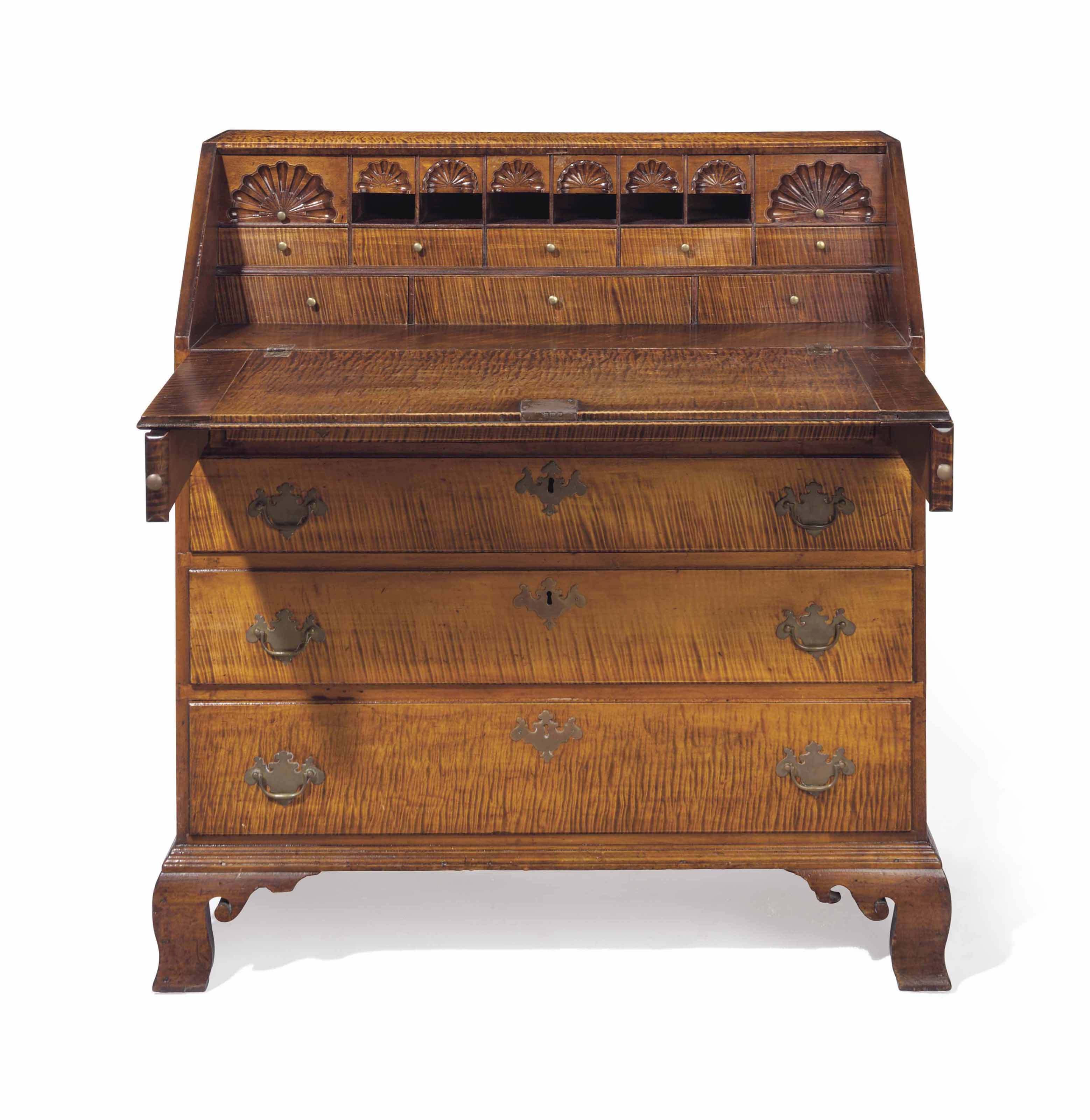 A Chippendale Figured Maple Slant Front Desk Attributed To The