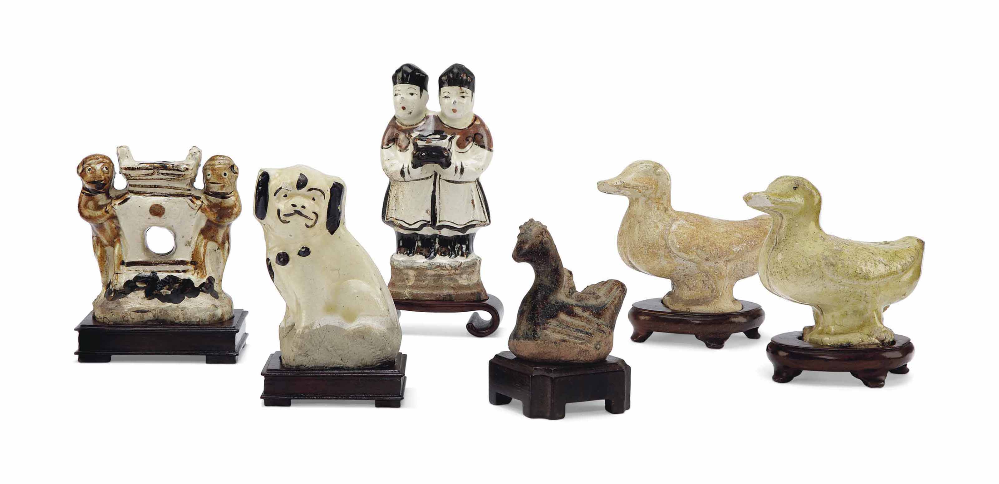 A GROUP OF SMALL FIGURES
