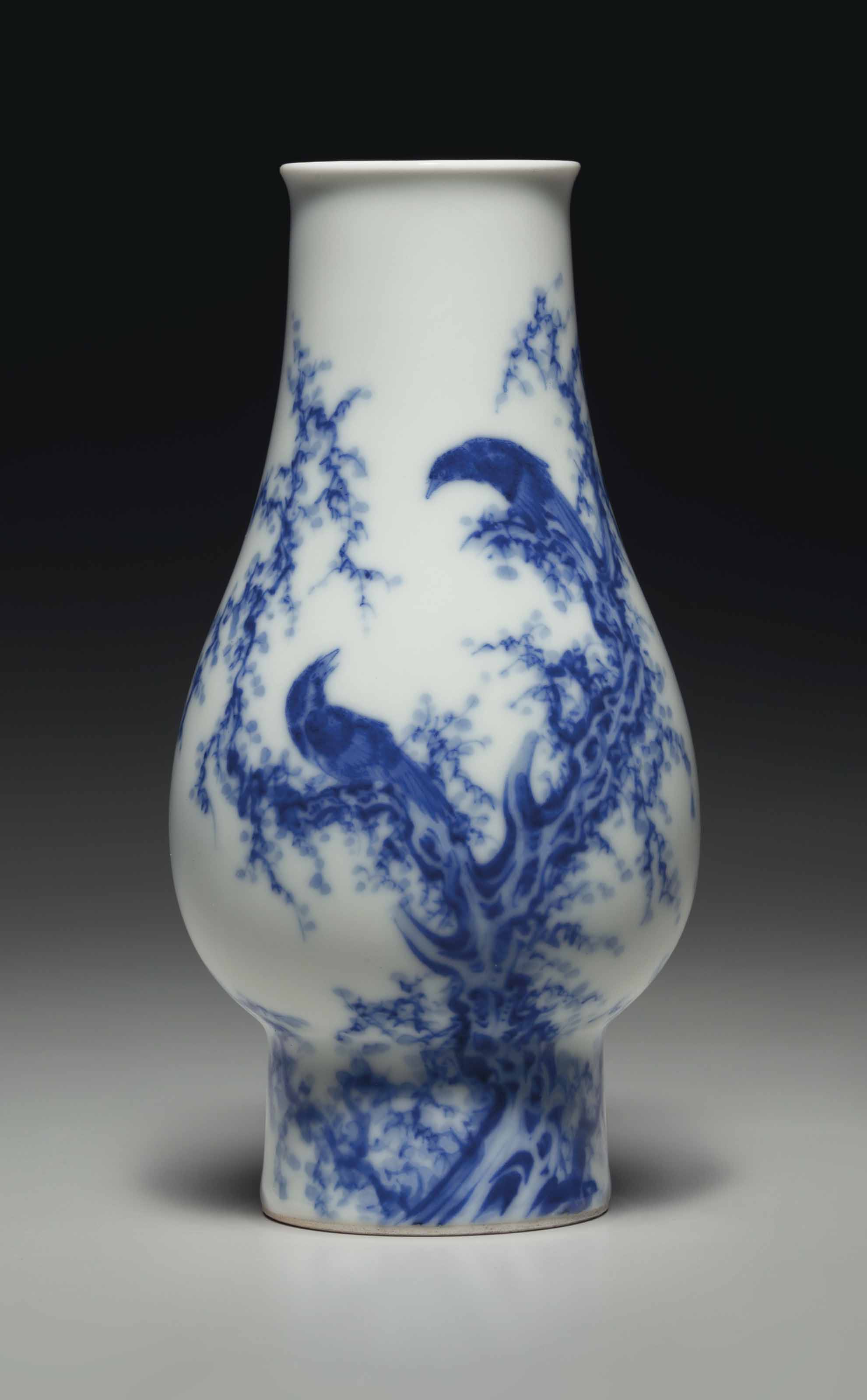 a small blue and white vase republic detailsx